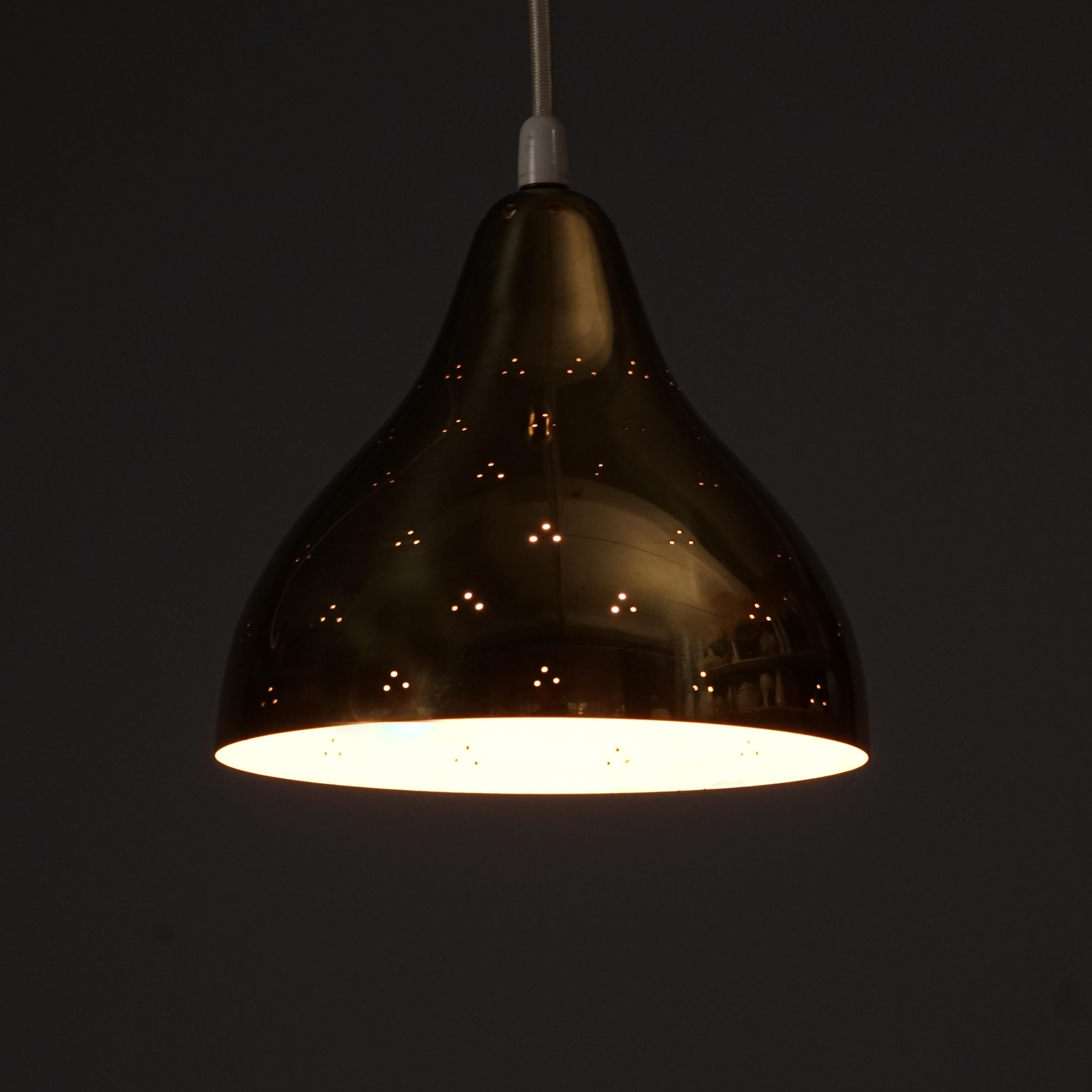 Gorgeous Itsu window pendant, 1950/1960s. Brass. Good vintage condition, minor patina consistent with age and use. The height of the pendant is adjustable and the pendant has plenty of cord length. The height indicated is the height where the