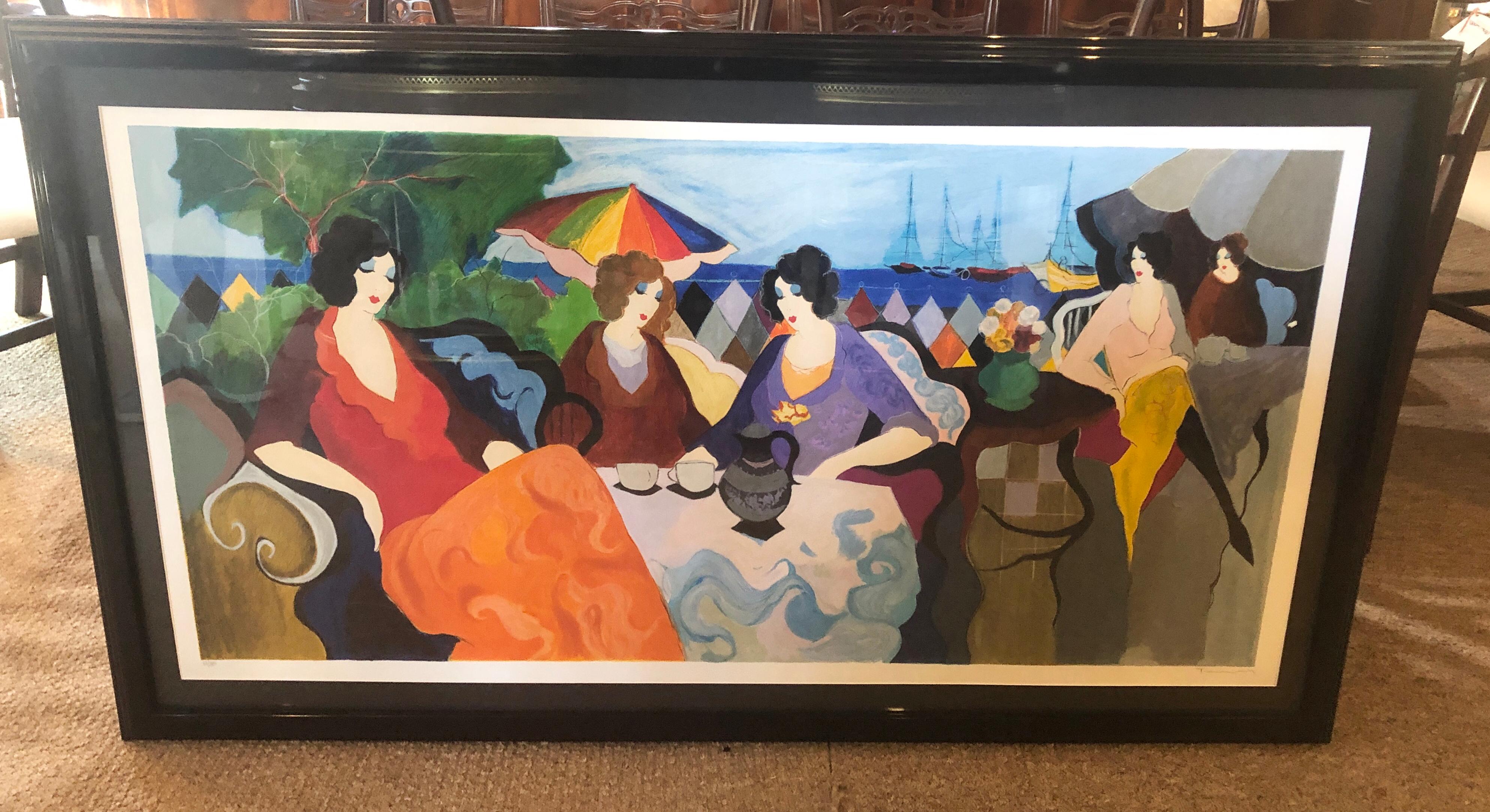 Large Tarkay depicting 5 Women in Cannes. Stereo Lithograph, pencil signed and numbered Tarkay lower right 69/375 in a fine black lacquered frame under plexiglass.
Itzchak Tarkay is considered to be a key figure in the modern figurative movement.