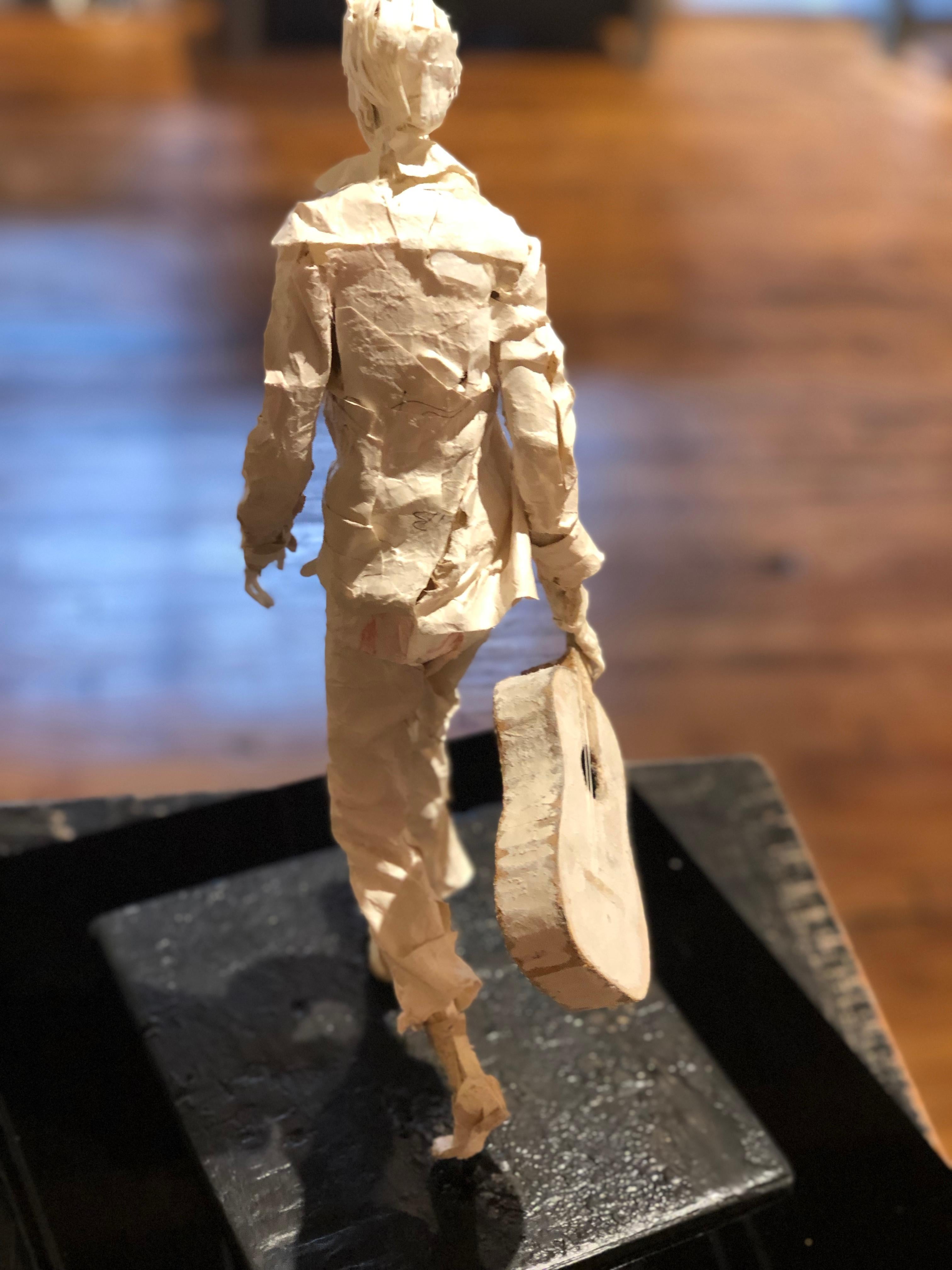Jimmy - Handmade Paper Sculpture of a Street Musician with Guitar Walking 1