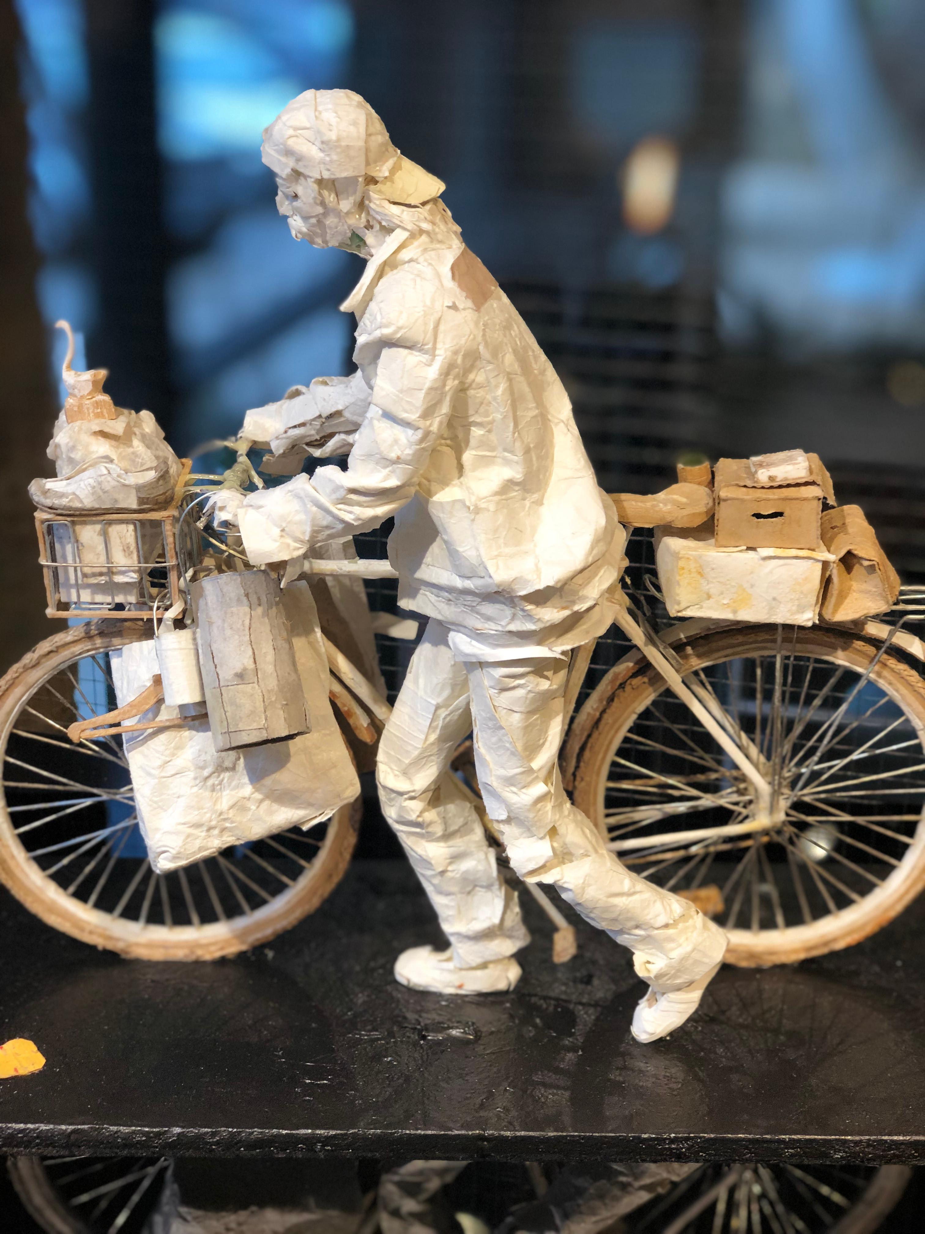 White Swan - Man on Bicycle Sculpture Made of Paper, Glue, Wire, and Wood 4