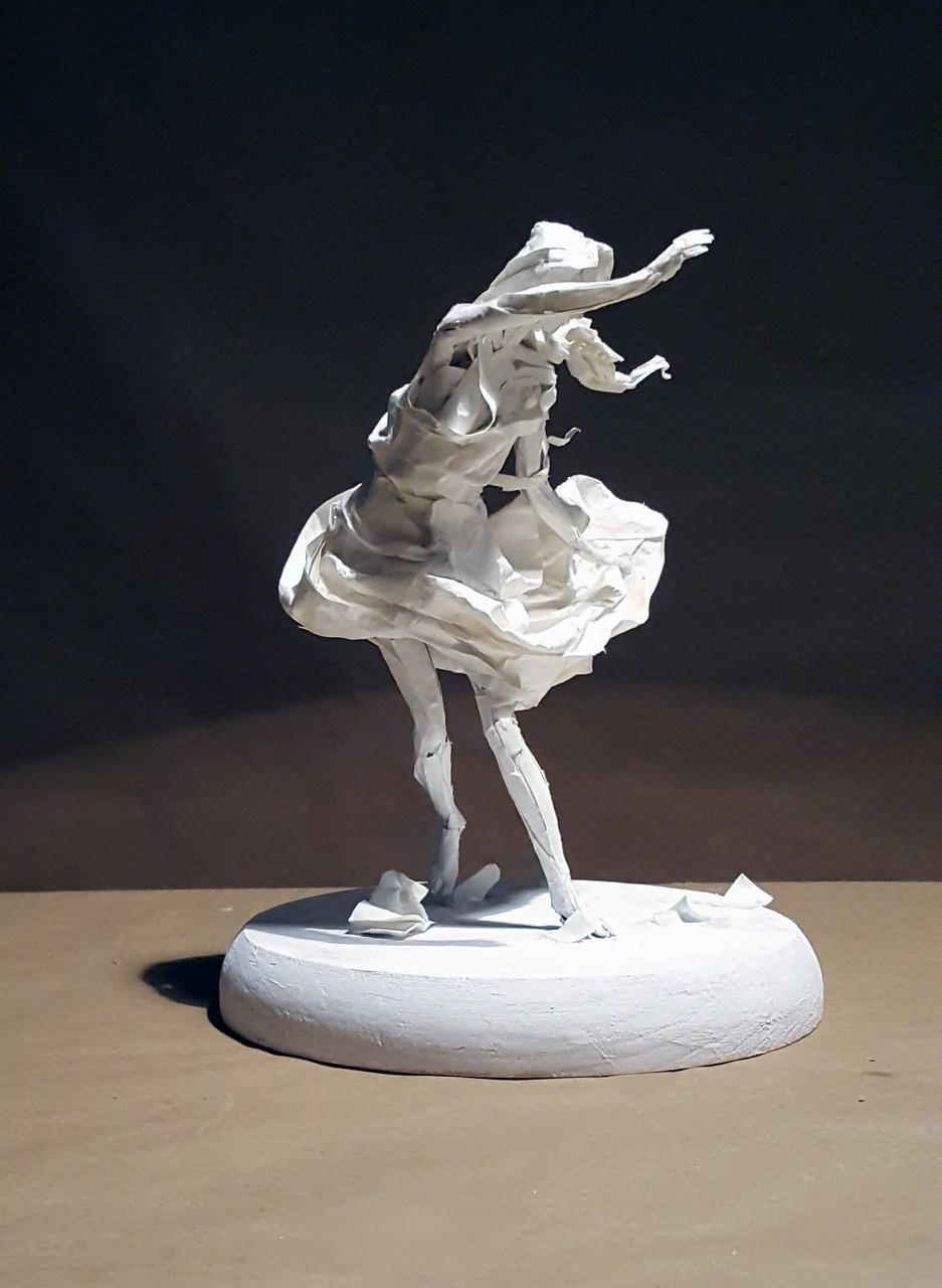 Ivan Markovic Figurative Sculpture - Windstorm - Paper Sculpture, Female Figure Swept Up in a Gust of Wind