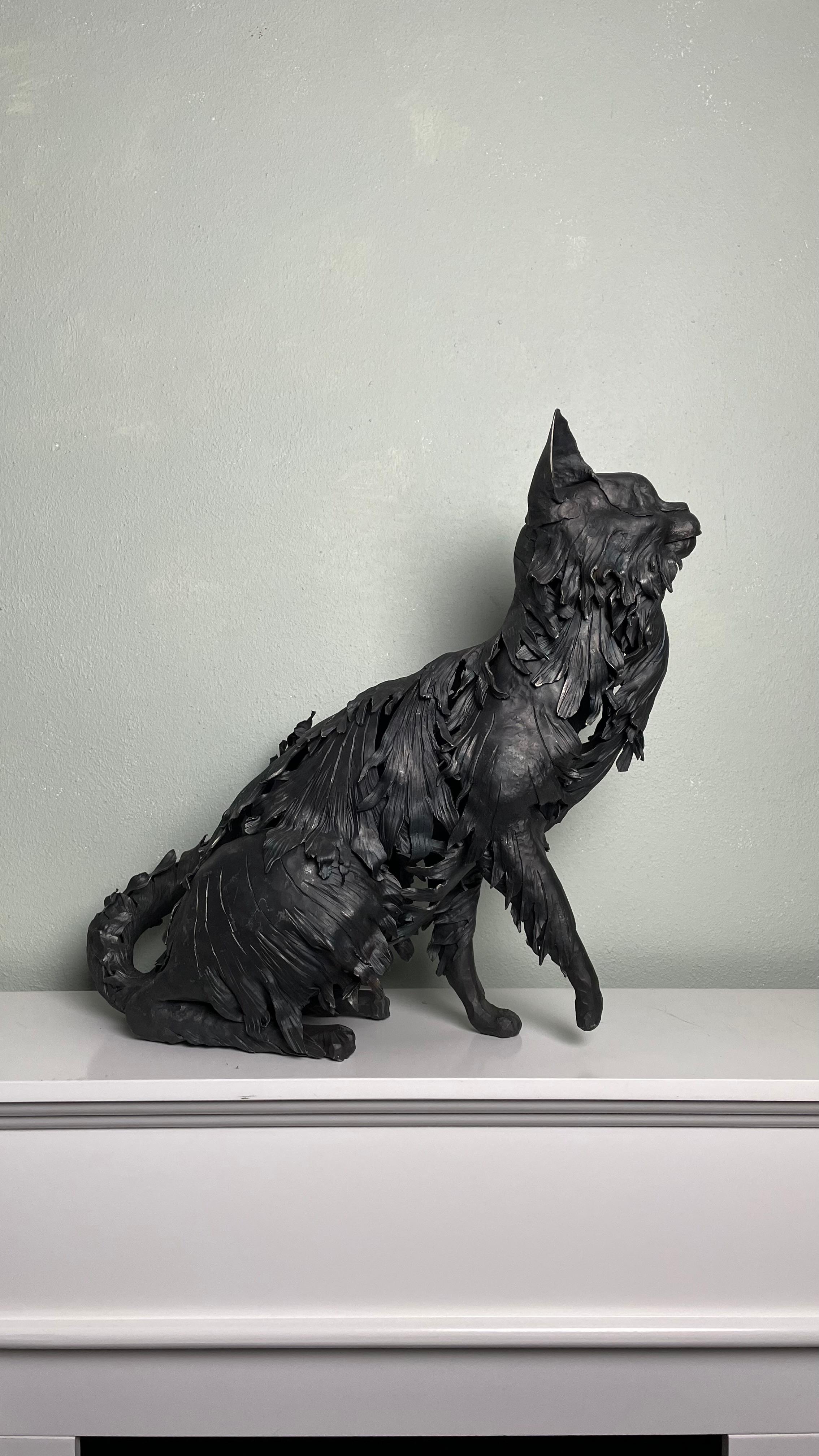 Cat in playful pose crafted in black wrough iron by Italian Master  - Sculpture by Ivan Zanoni