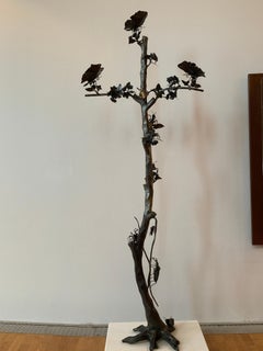 Forest themed wrought iron sculpture with plants and animals by Italian smith