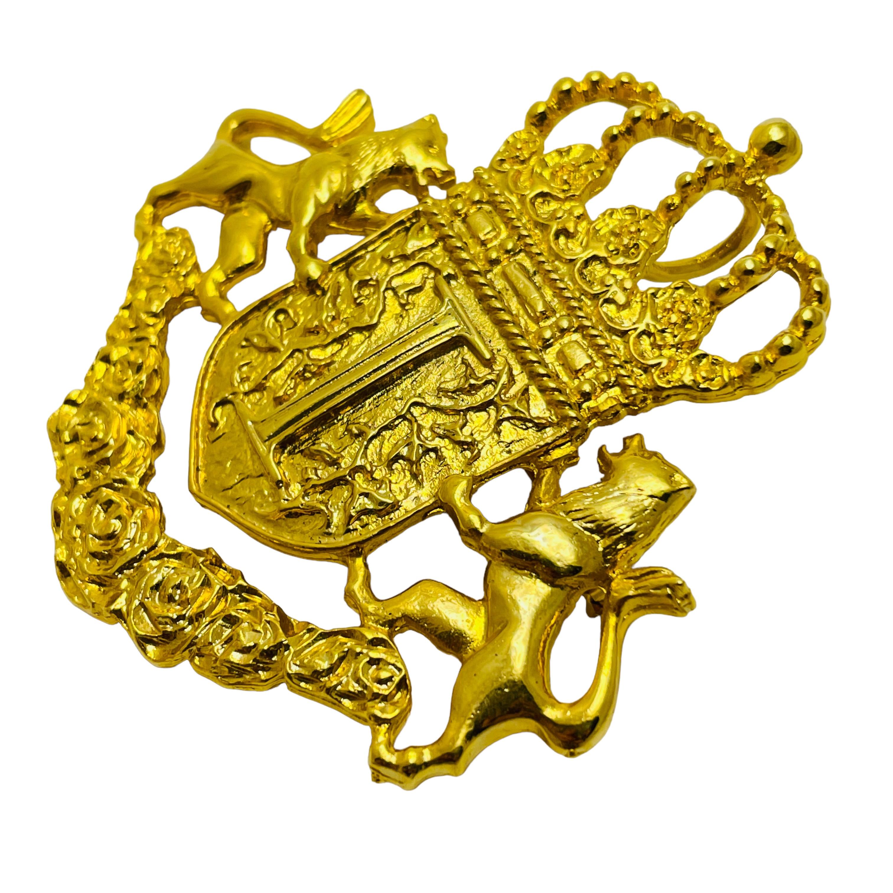 Women's or Men's IVANA vintage gold lions crown shield designer runway brooch For Sale