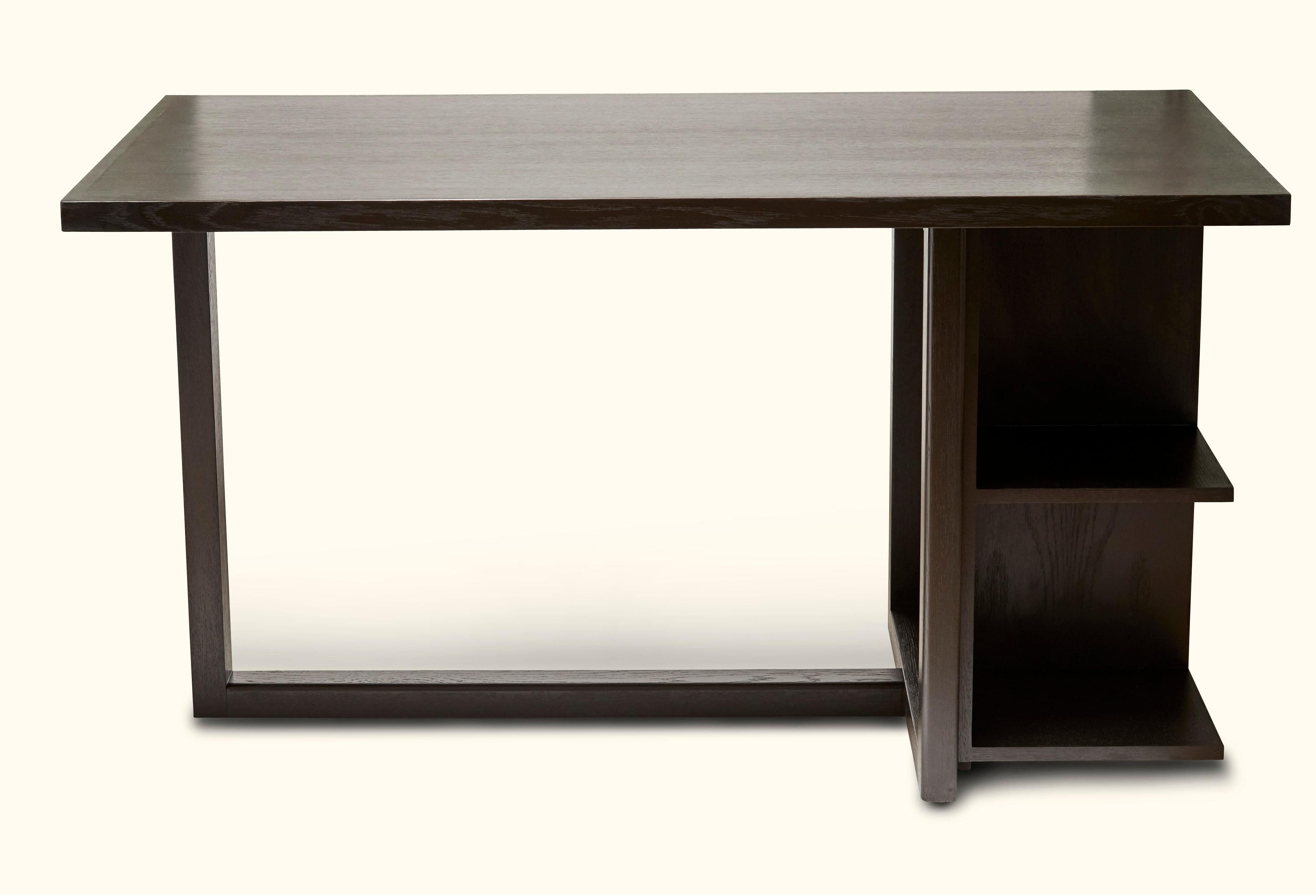 The Ivanhoe desk features a cantilevered base with open display shelves. Available in American walnut or white oak and drawers are available upon request. Shown here in dark Greywashed oak. Available finishes may vary. 

The Lawson-Fenning