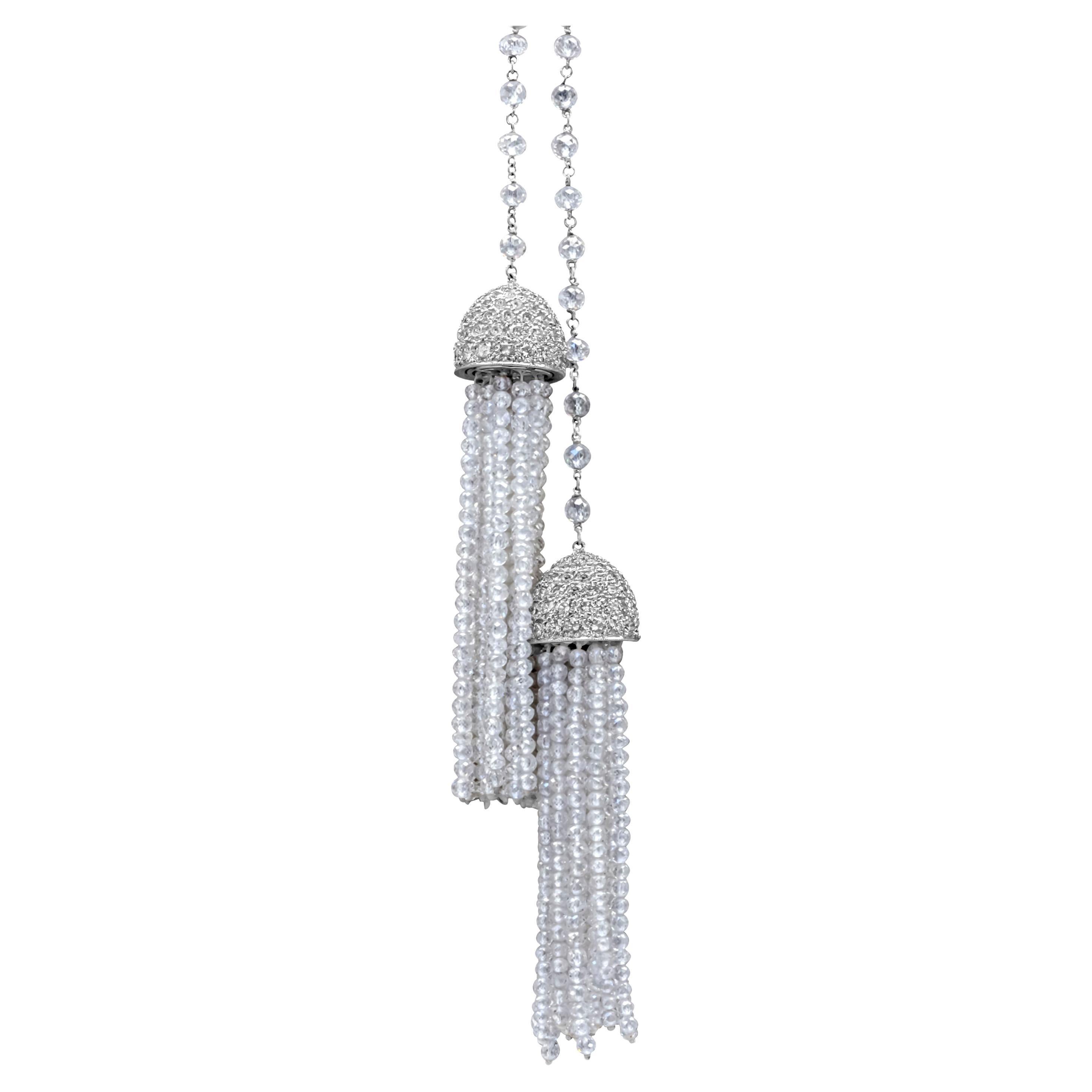 This magnificent and spectacular necklace features round brilliant Diamond-capped briolette diamond tassels, suspended from a diamond chain necklace. With a spring rings closure. This stunning diamond necklace has approximately 116.77 carats of