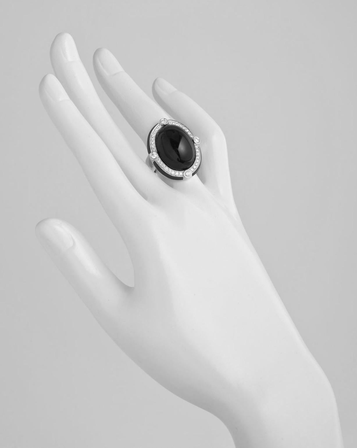 IVANKA TRUMP

Black Onyx & Diamond Cocktail Ring
Cabochon-cut oval black onyx cocktail ring in polished 18k white gold with round-cut diamond accents. 0.72 total carats of diamonds. Designed by Ivanka Trump. Size 6.