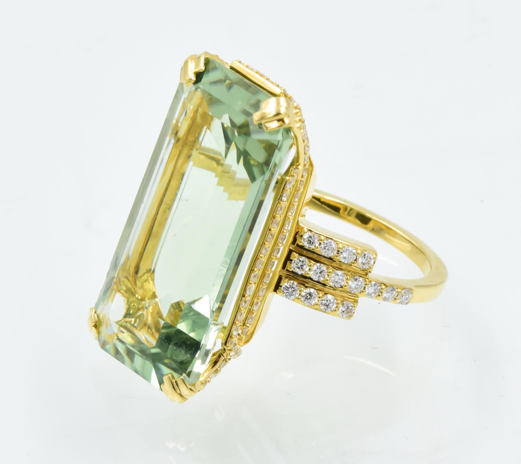 This Ivanka Trump ring is like new and an Empire collection design.  The center prasiolite is 24x12mm in size.  This ring has round brilliant cut diamonds accenting the center mounting and down the side.  This design is in excellent condition and