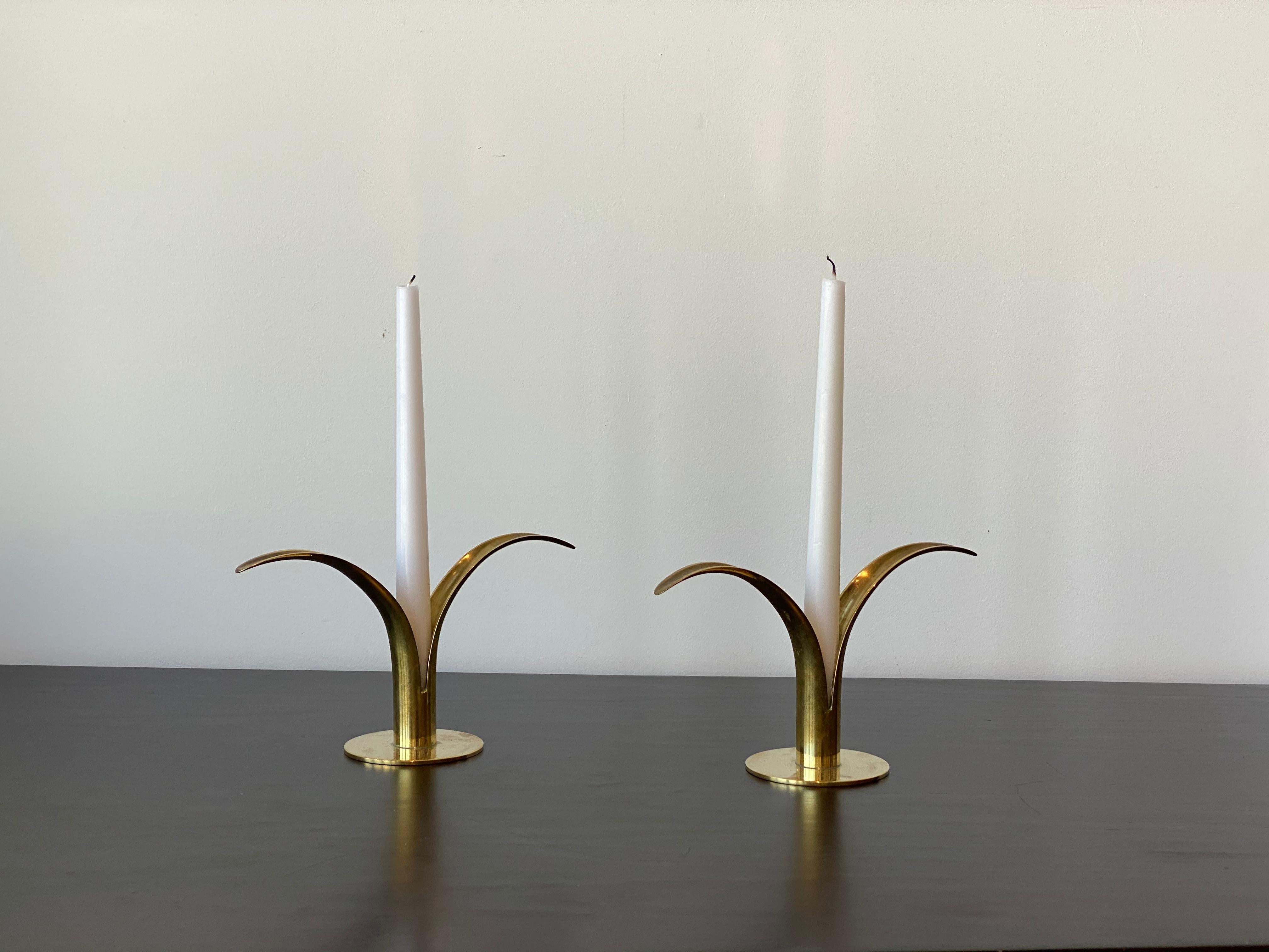 A pair of organic candlesticks / candleholders, designed by Ivar Åhlenius Björk for Ystad Metall, Sweden, 1950s. In brass and lacquered steel. Stamped.

Other designers of the period include Piet Hein, Paavo Tynell, Josef Frank, and Jean