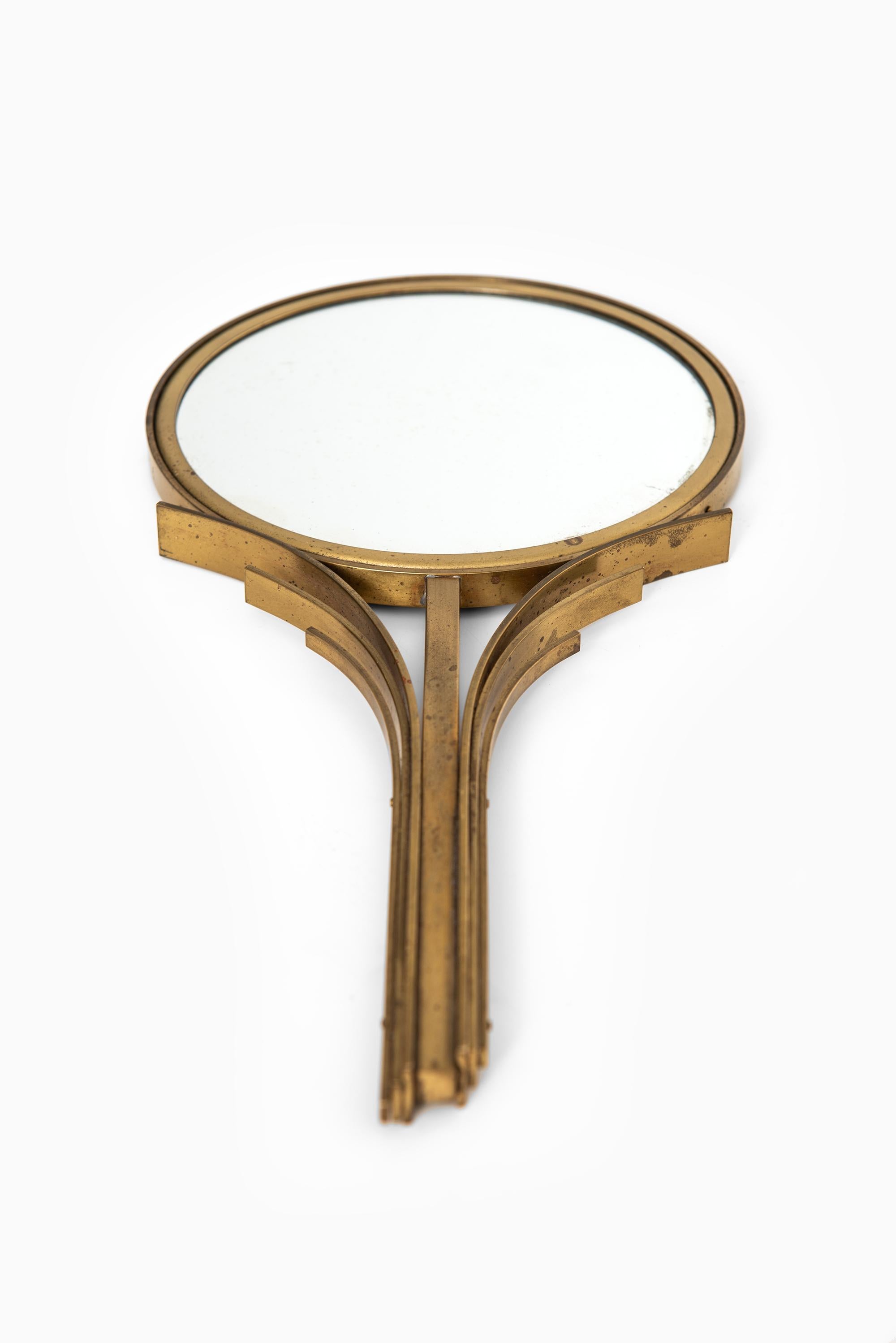 Rare Art Deco Mirror designed by Ivar Ålenius Björk. Produced by Ystad metall in Sweden.