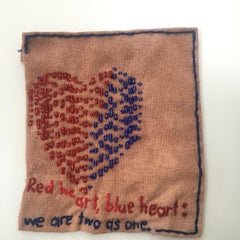 Heart - love narrative embroidery with blue red beads on brown vintage fabric