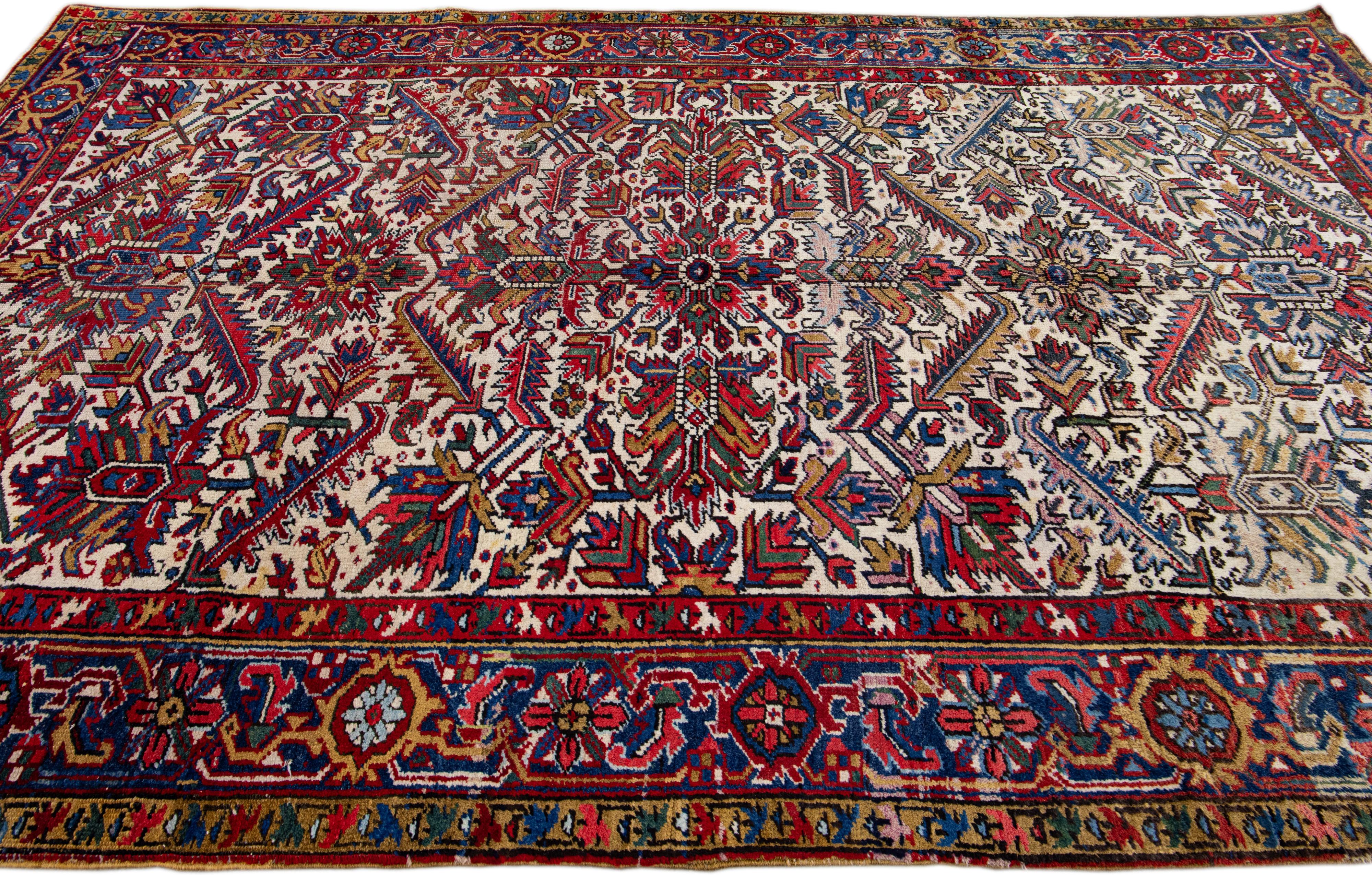 Ivory Antique Persian Heriz Handmade Allover Floral Wool Rug In Good Condition For Sale In Norwalk, CT