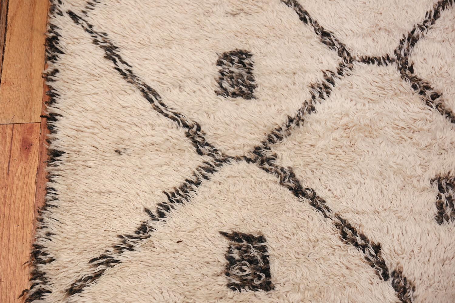 Beautiful and Primitive Ivory Shag Pile Vintage Beni Ourain Moroccan Rug, Country of Origin / Rug Type: Morocco, Circa date: Mid – 20th Century. Size: 6 ft 6 in x 12 ft 3 in (1.98 m x 3.73 m).