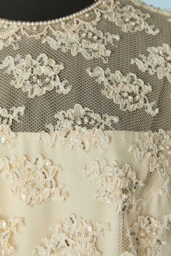 Abito da cocktail in pizzo avorio con perline e pieghe a raggi di sole Jack Bryan Circa anni '60