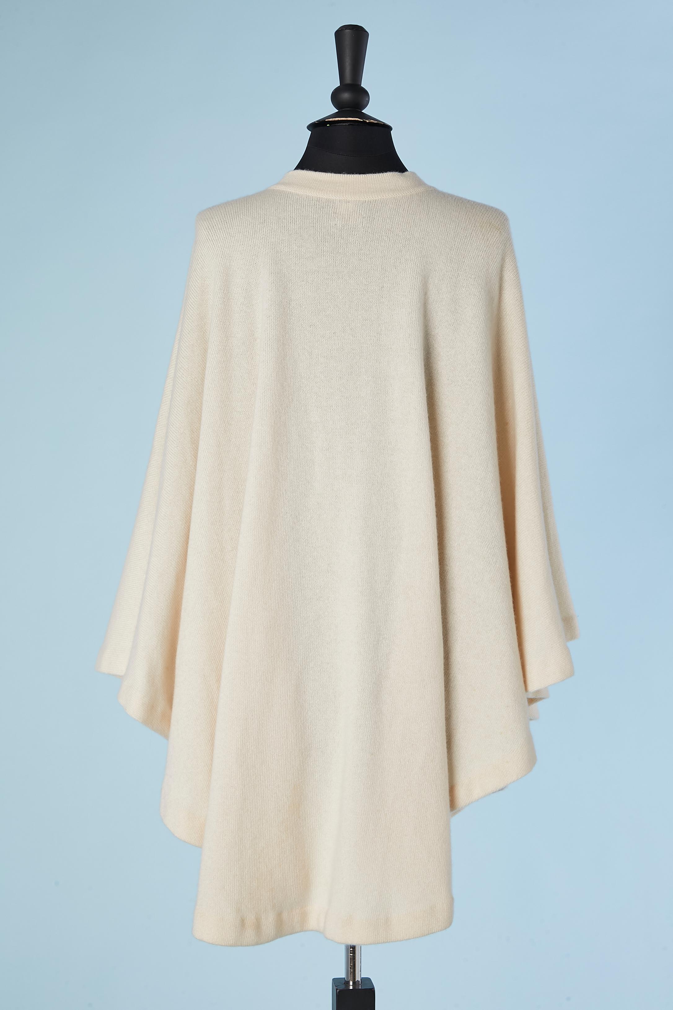 Ivory cape-cardigan in cashmere with branded gold metal buttons Chanel  1