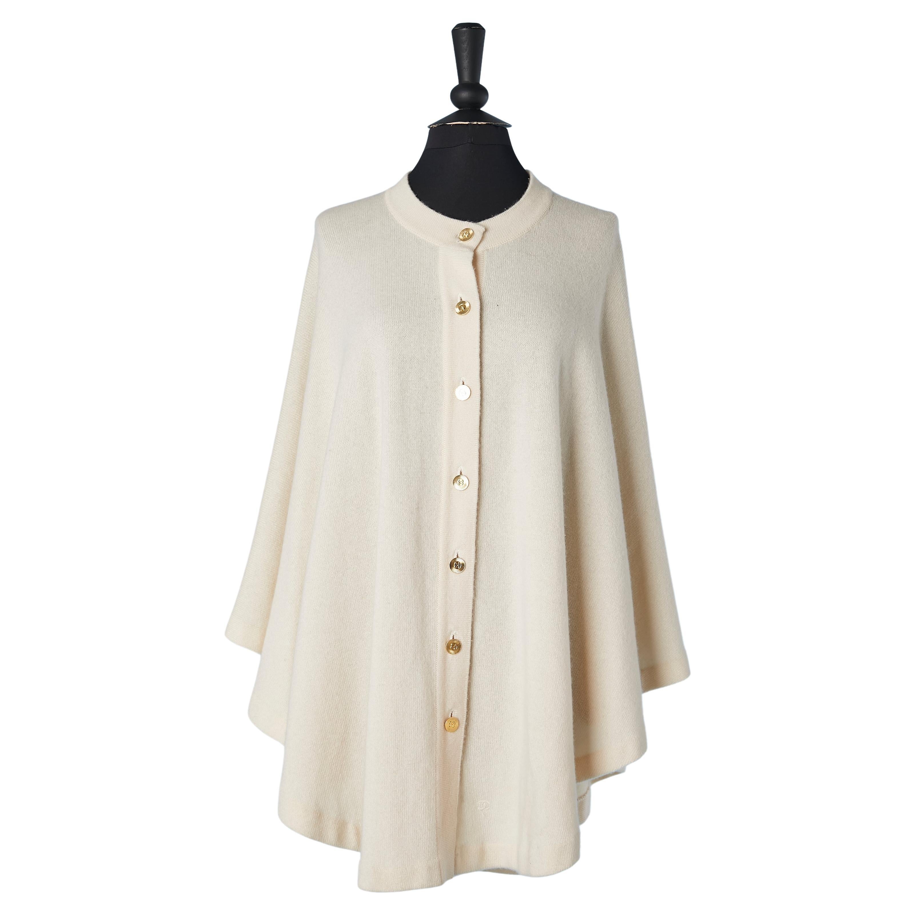 Ivory cape-cardigan in cashmere with branded gold metal buttons Chanel 