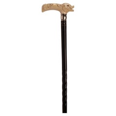 Ivory carved handle walking stick depicting a wild boar, United States 1910.