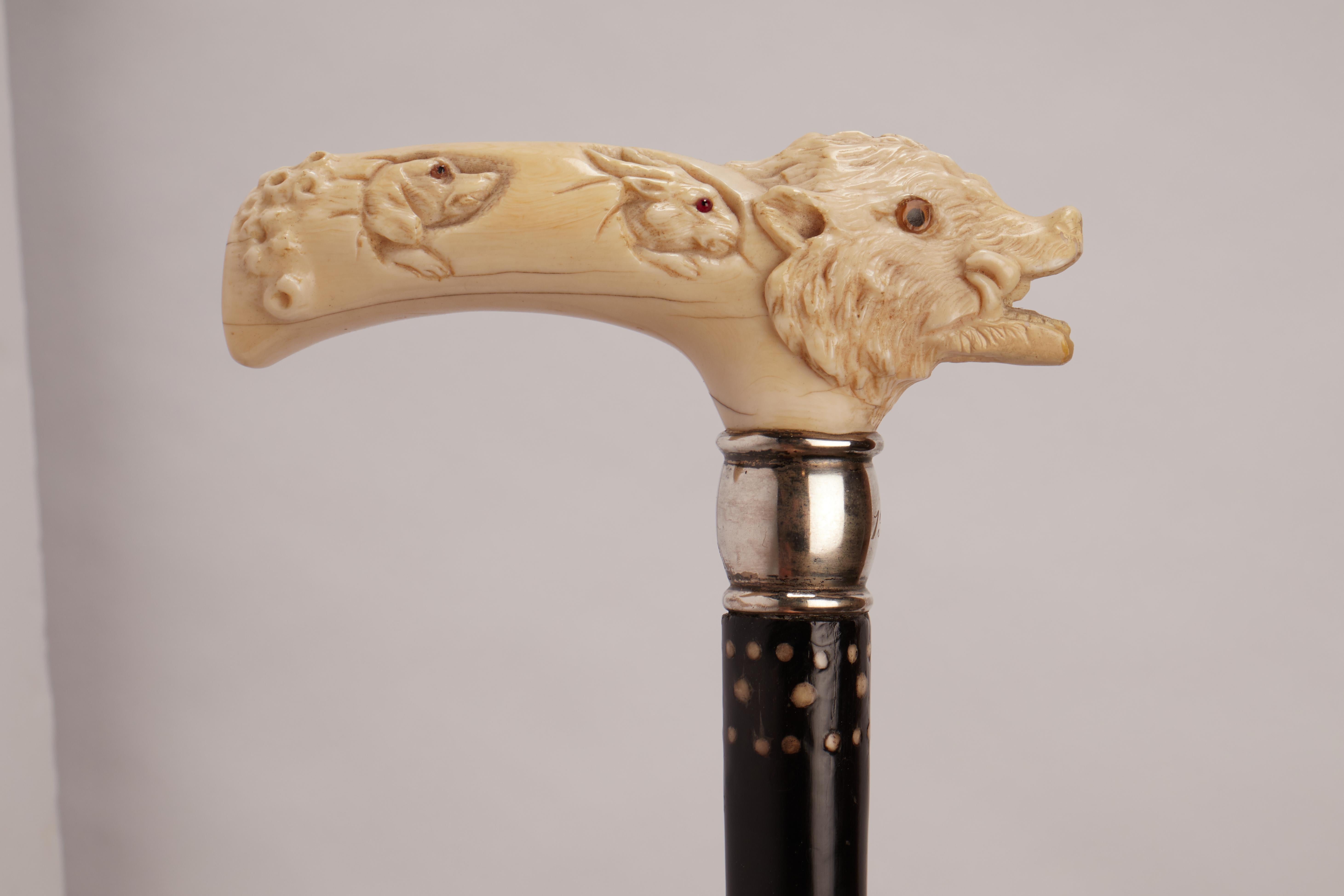 American Ivory carved handle walking stick depicting a wild boar, USA 1910.  For Sale