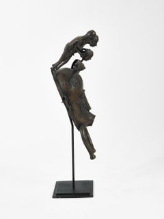 Maschera baul Senufo Kpelie della Costa d’Avorio, in bronzo fuso, raffigurante membri della tribù, su piedistallo