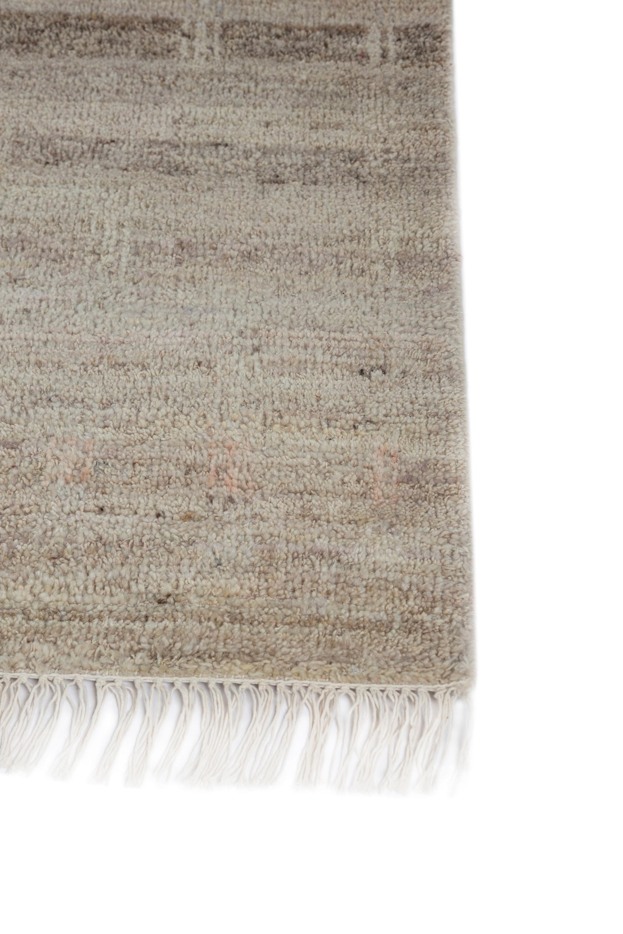 Entrez dans le monde du design raffiné avec ce superbe tapis en laine de notre collection Thyme. Ce tapis en laine se distingue par son motif à la fois doux et percutant, qui crée une profondeur et un volume visuels, même dans les espaces les plus