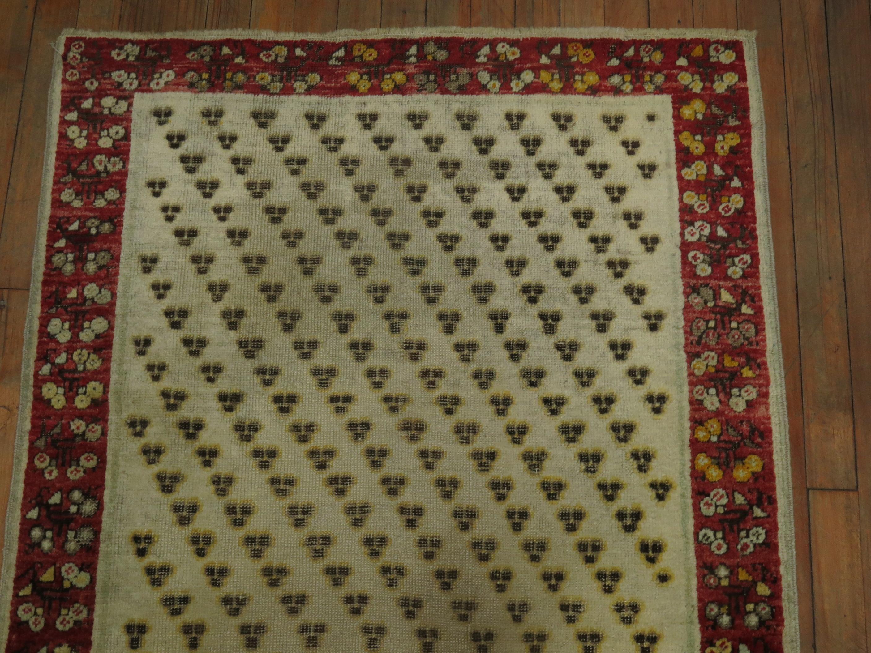 19th Century Wool 20th Century Handmade Ivory Field Red Turkish Ghiordes Scatter Rug For Sale