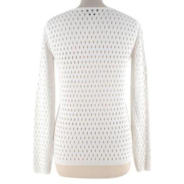 Tom Ford Ivory Fishnet Long Sleeve Top
 

 - All over small hole 'net-like' pattern 
 - V neckline 
 - Ribbed hem , cuffs and neck
 

 Materials:
 75% Rayon
 25% Polyester 
 

 Made in Italy 
 

 Dry clean only 
 

 9.5/10 excellent condition with