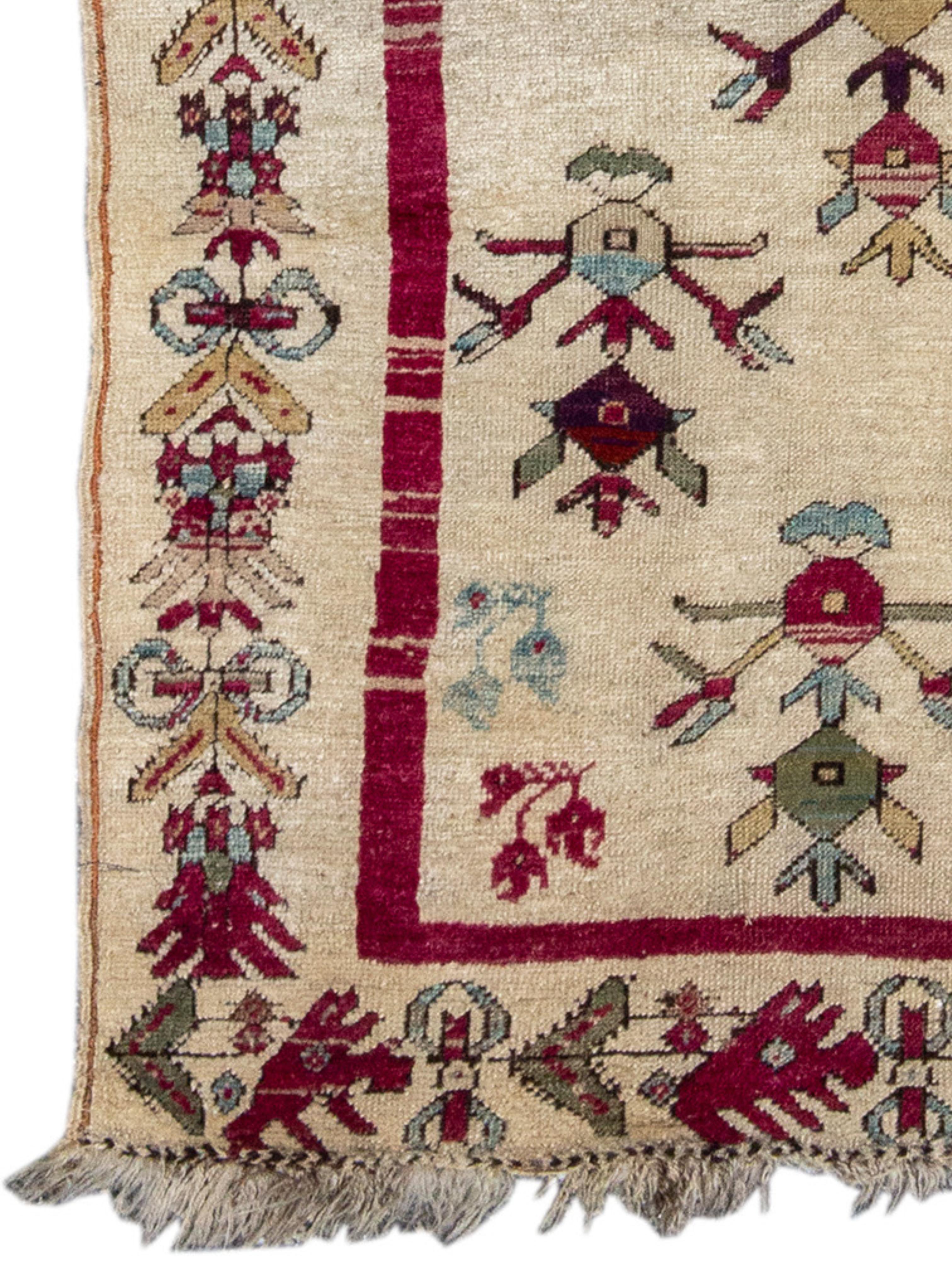 Ghiordes Prayer Rug, 19th Century

This prayer rug features a stylized floral design with an ivory background. It was featured in the 1991 exhibition 