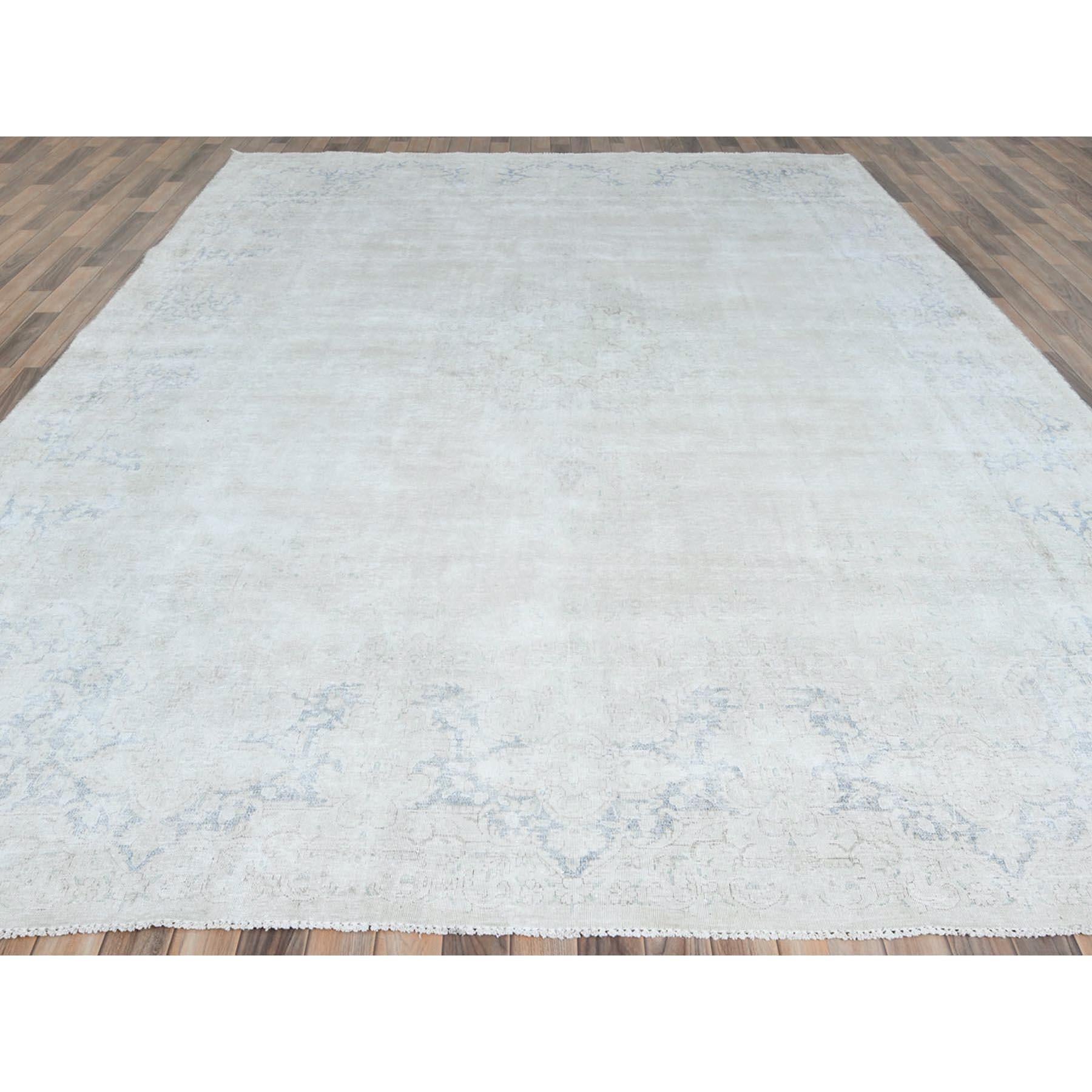 Medieval Ivory Hand Knotted Cropped Thin Old Persian Kerman Worn Wool Distressed Rug For Sale