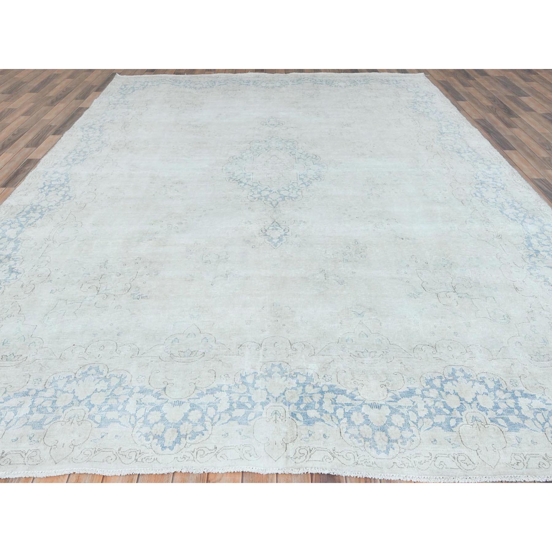 Medieval Ivory Hand Knotted Cropped Thin Worn Wool Old Persian Kerman Distressed Rug For Sale