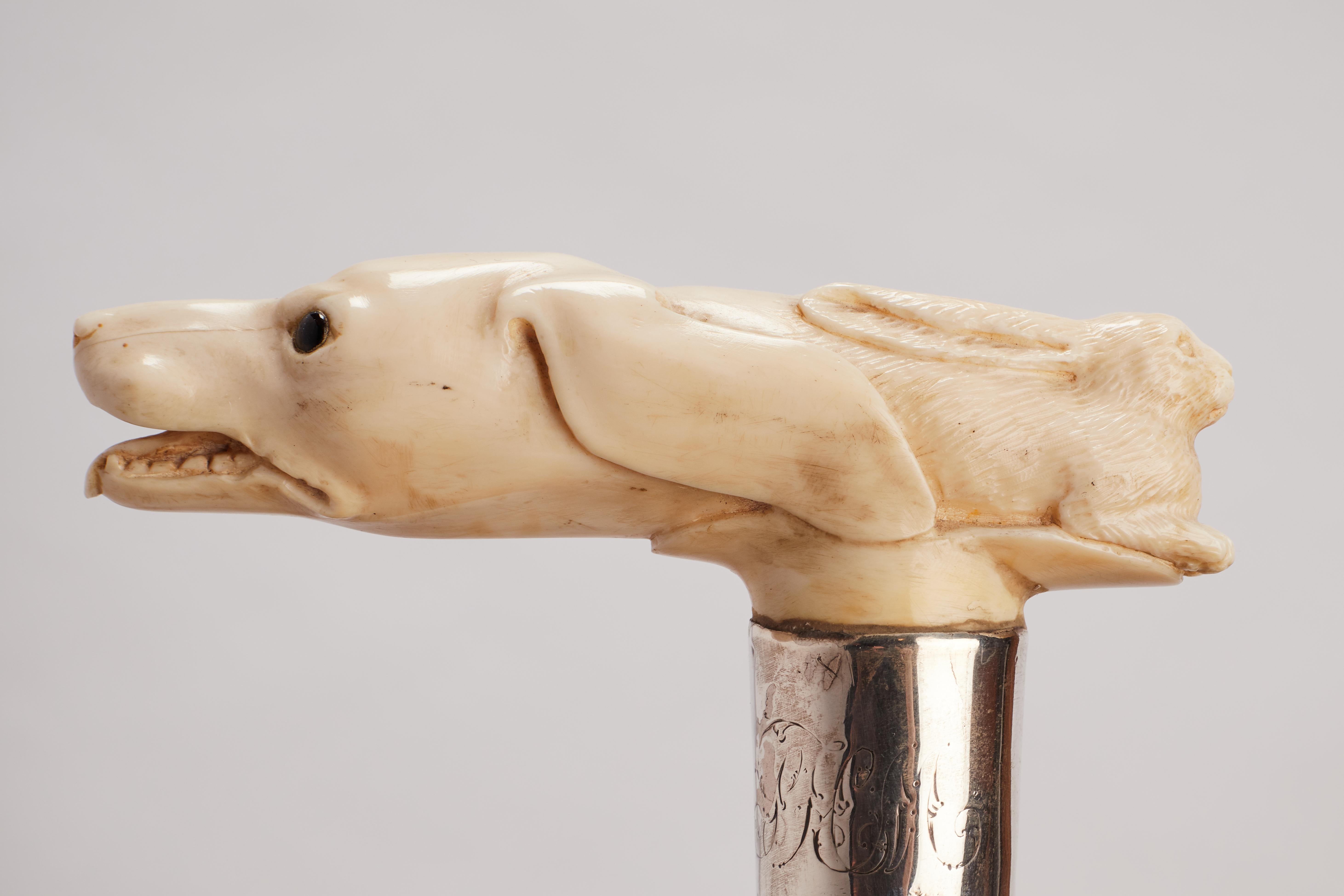20th Century Ivory handle walking stick depicting a dog and a hare, UK 1890.  For Sale