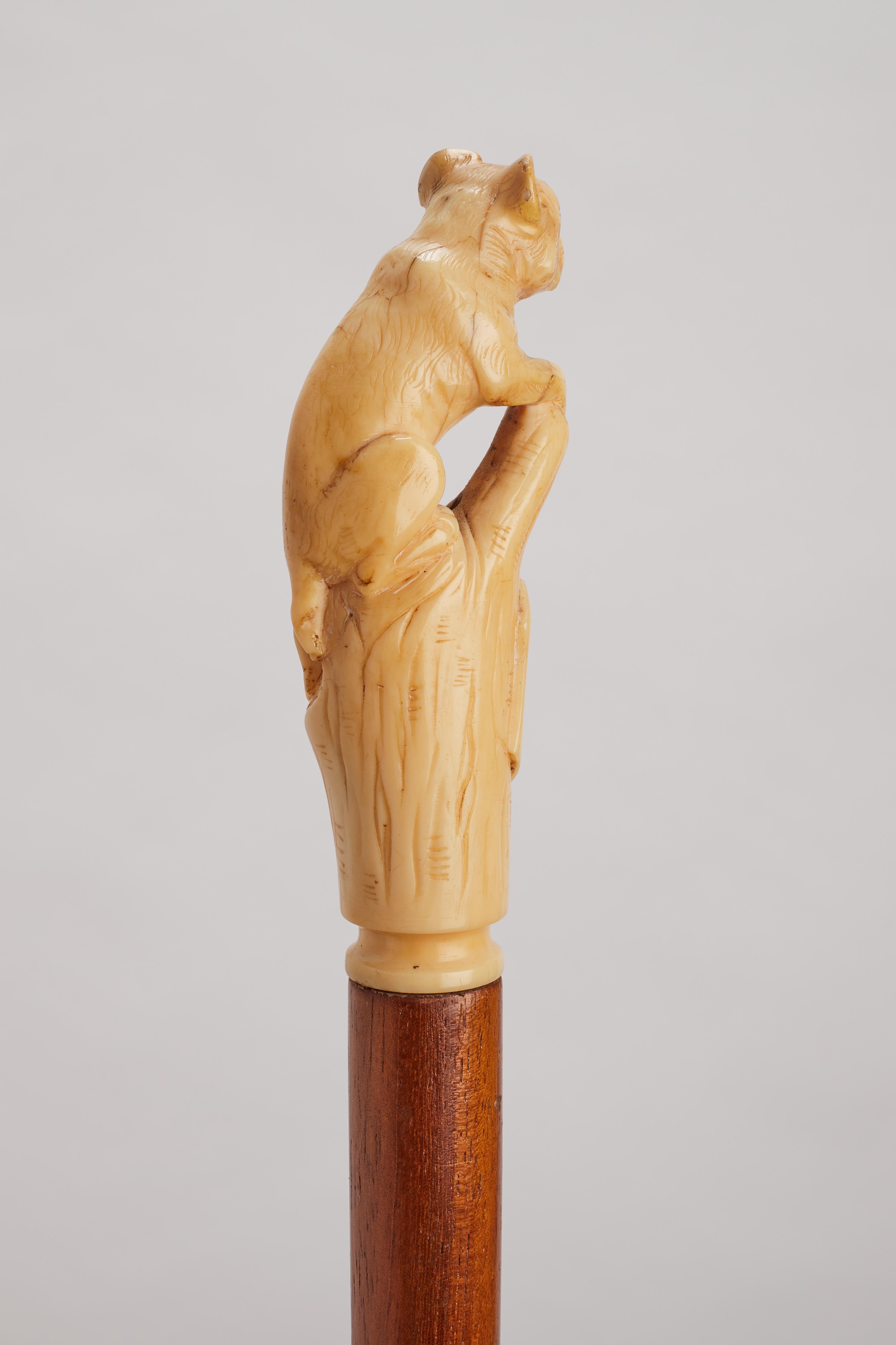 Metal Ivory handle walking stick depicting a French bulldog, France 1880. For Sale