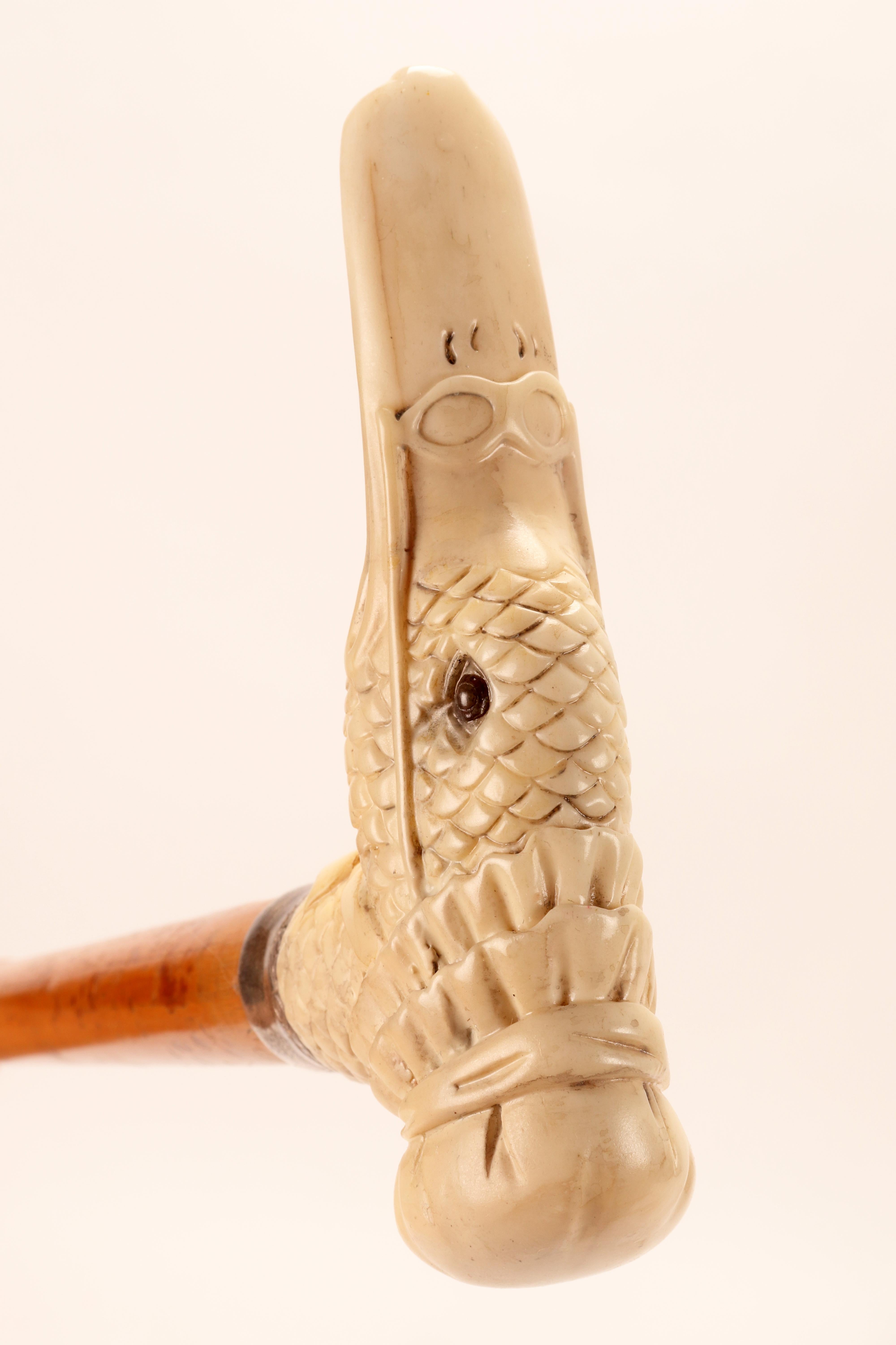 Silver Ivory handle walking stick depicting a goose head, Austria1880.  For Sale