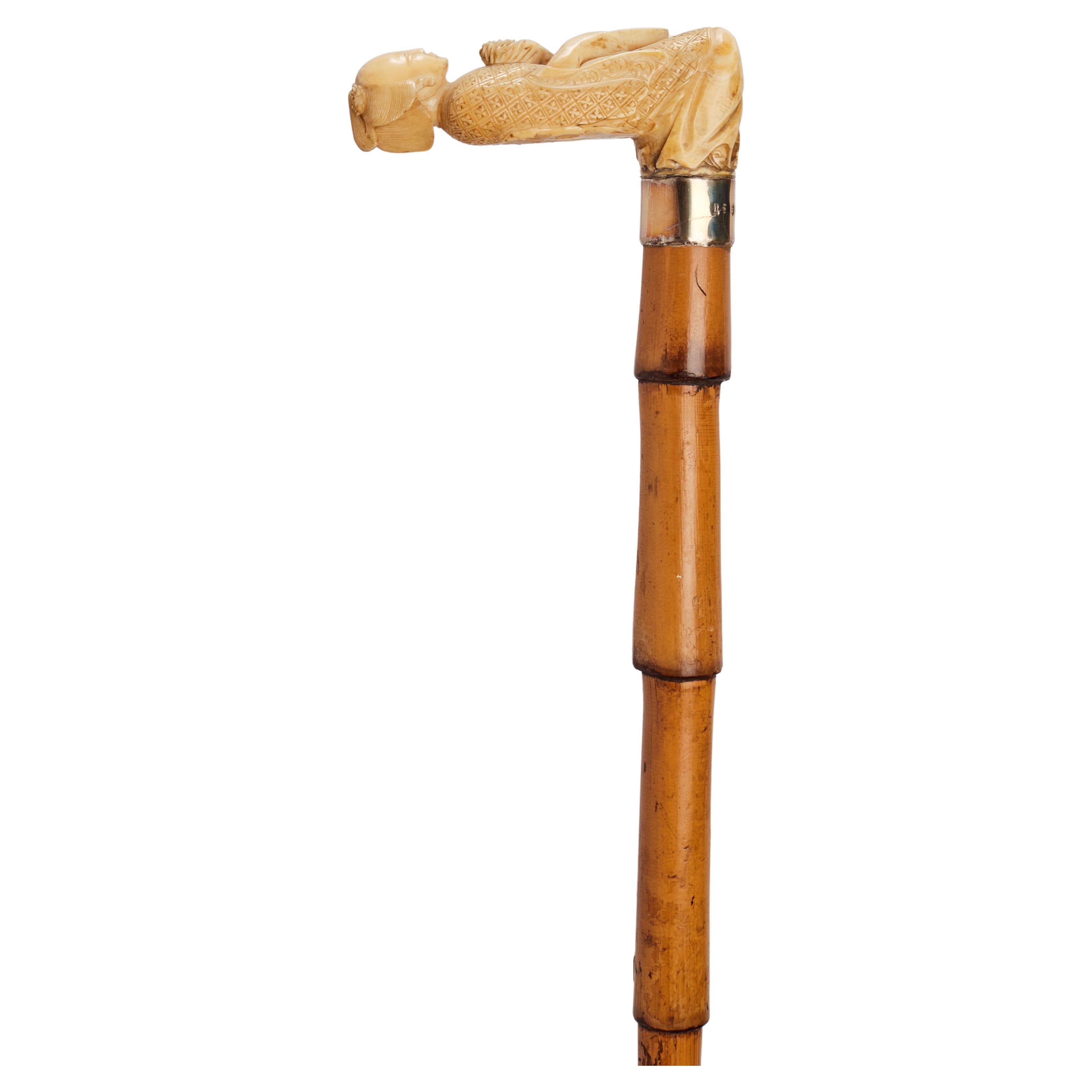 Ivory handle walking stick depicting a Japonise woman jneeling, Europe 1900.