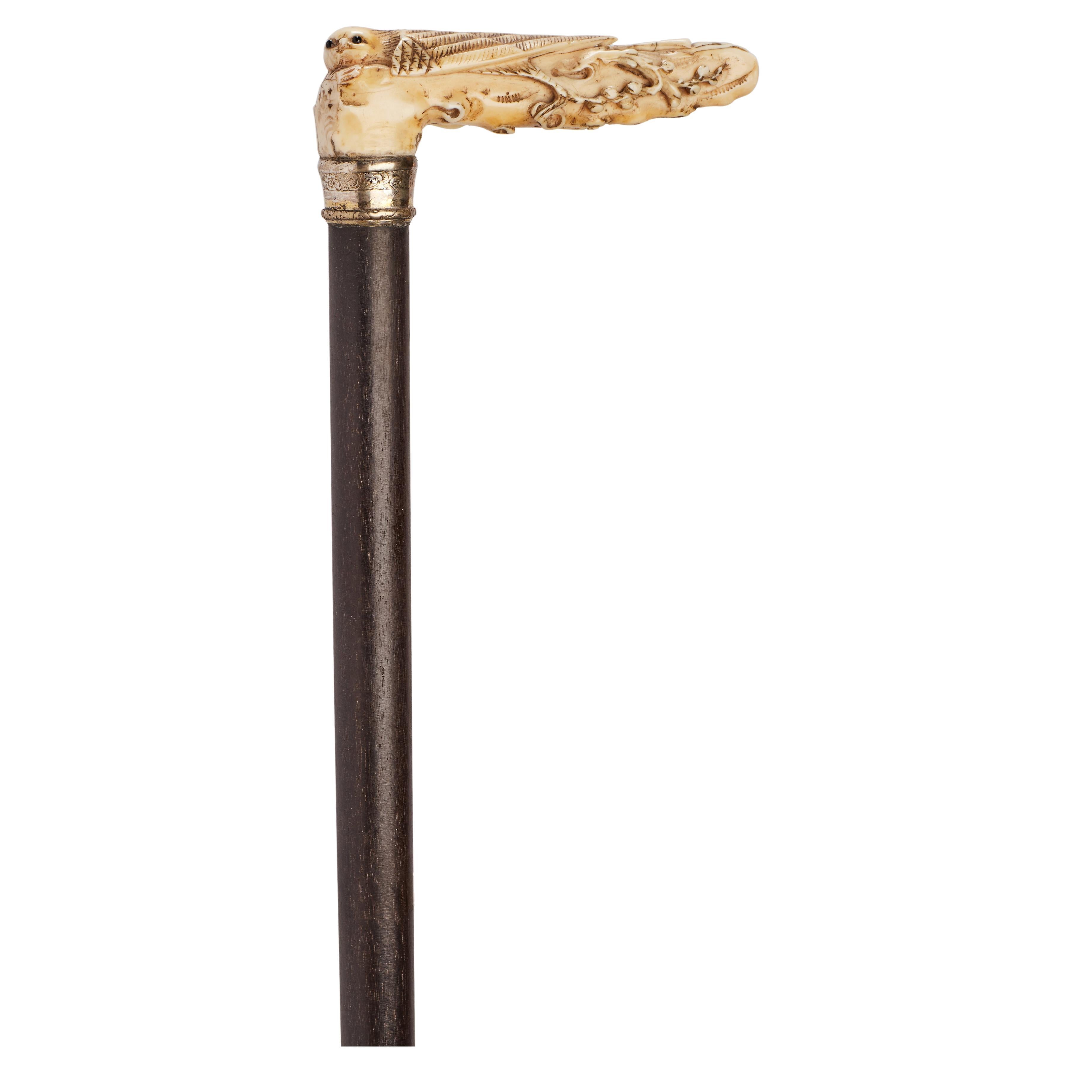 Ivory handle walking stick depicting an owl on cherry flower, Great Britain 1900
