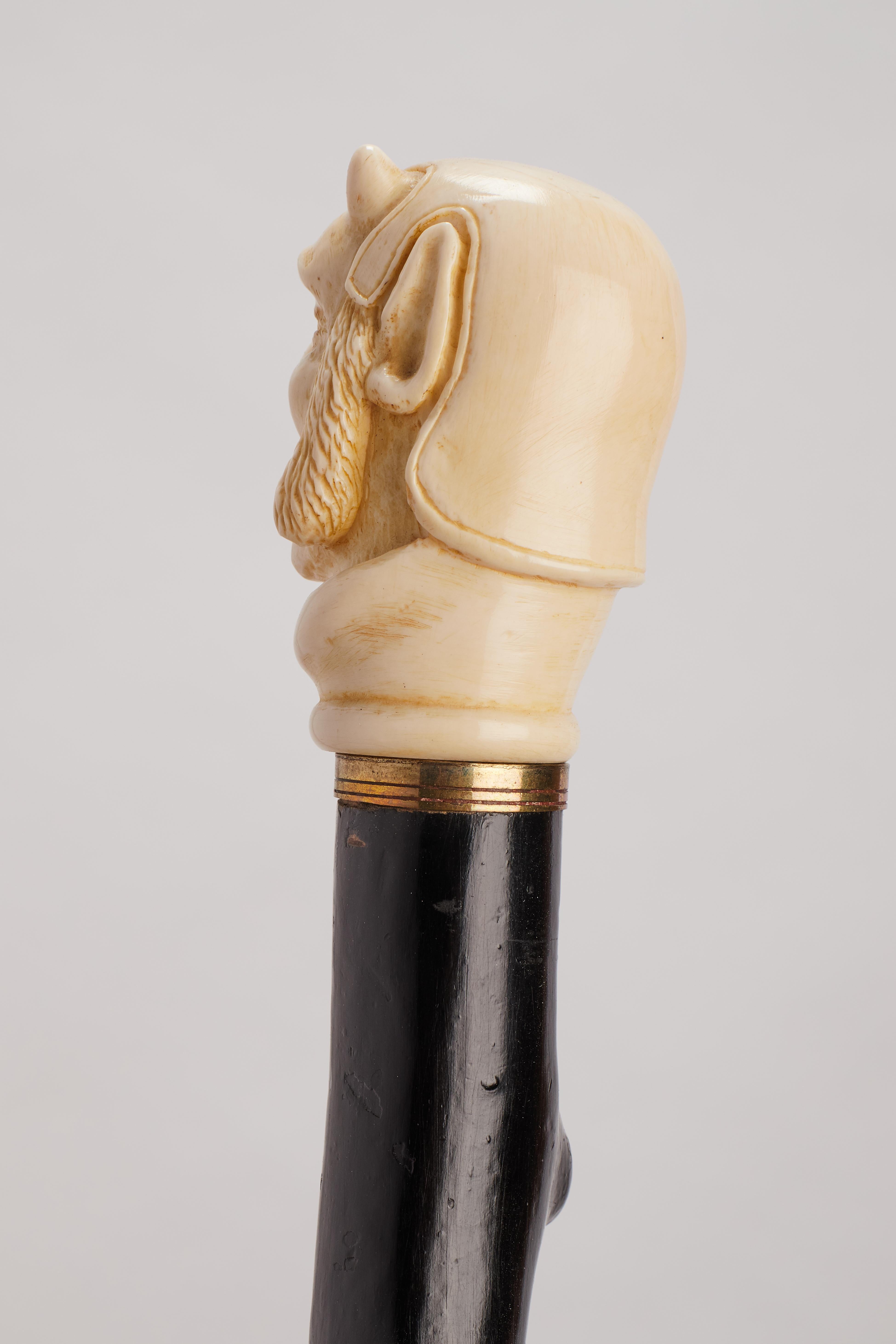 Ivory handle walking stick depicting Mephistopheles face, England 1870. For Sale 2