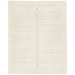 Elfenbeinfarbener handgefertigter moderner Wollteppich mit minimalistischem marokkanischem Stil