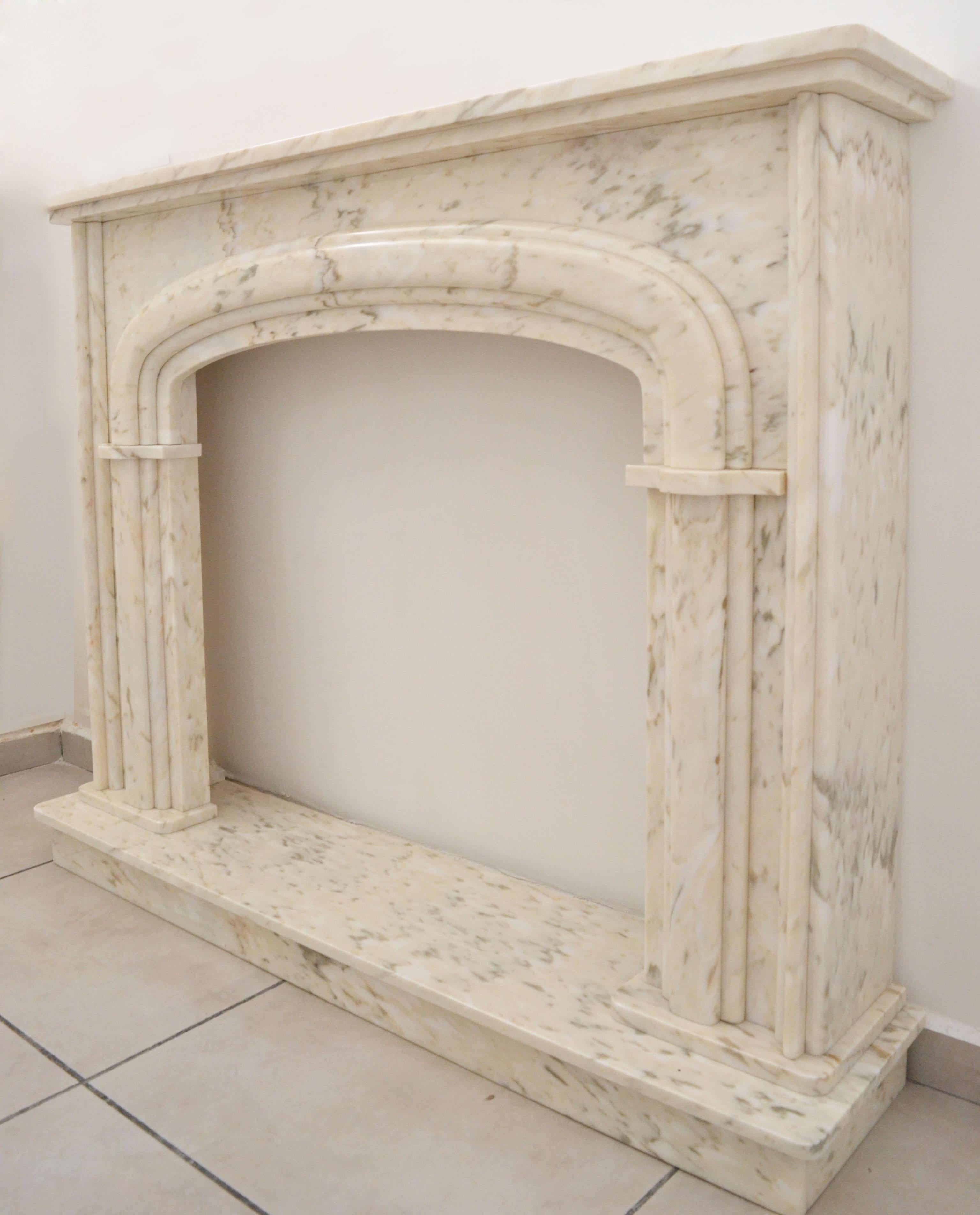 A beautiful brand new fireplace surround / mantel designed by the Spanish Design House Element&Co.

Crafted from Italian ivory marble sourced from the Verona region this piece will provide a Classic finishing touch for any lounge.

The soft curves