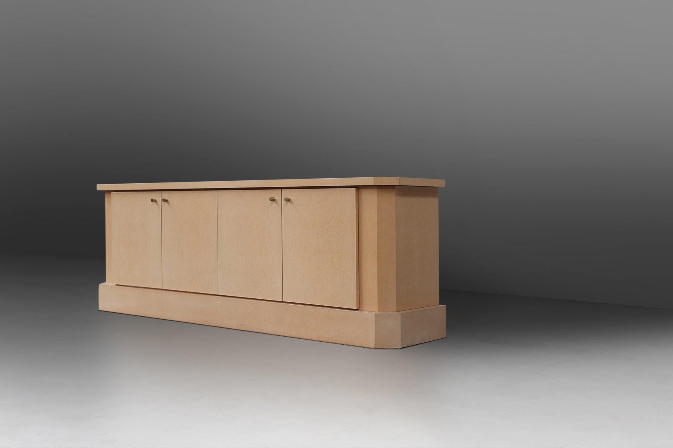 High quality luxurious sideboard by Jean Claude Dresse in the 1970s. Jean Claude Dresse is a highly appreciated Belgian artist and designer. 

This glamorous statement piece was made with high attention for detail in beautiful rich burl wood with