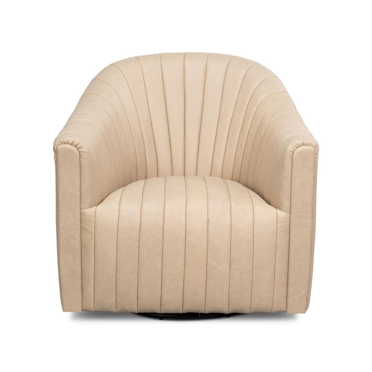 This classic barrel-shaped swivel chair is upholstered in premium top-grain ivory leather, offering a luxurious feel and lasting durability. Vertical channel tufting enhances the tailored aesthetic, adding texture and modern charm, while the