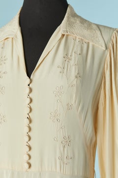 Ivory long silk dress with threads embroideries and top-stitching Circa 1970's