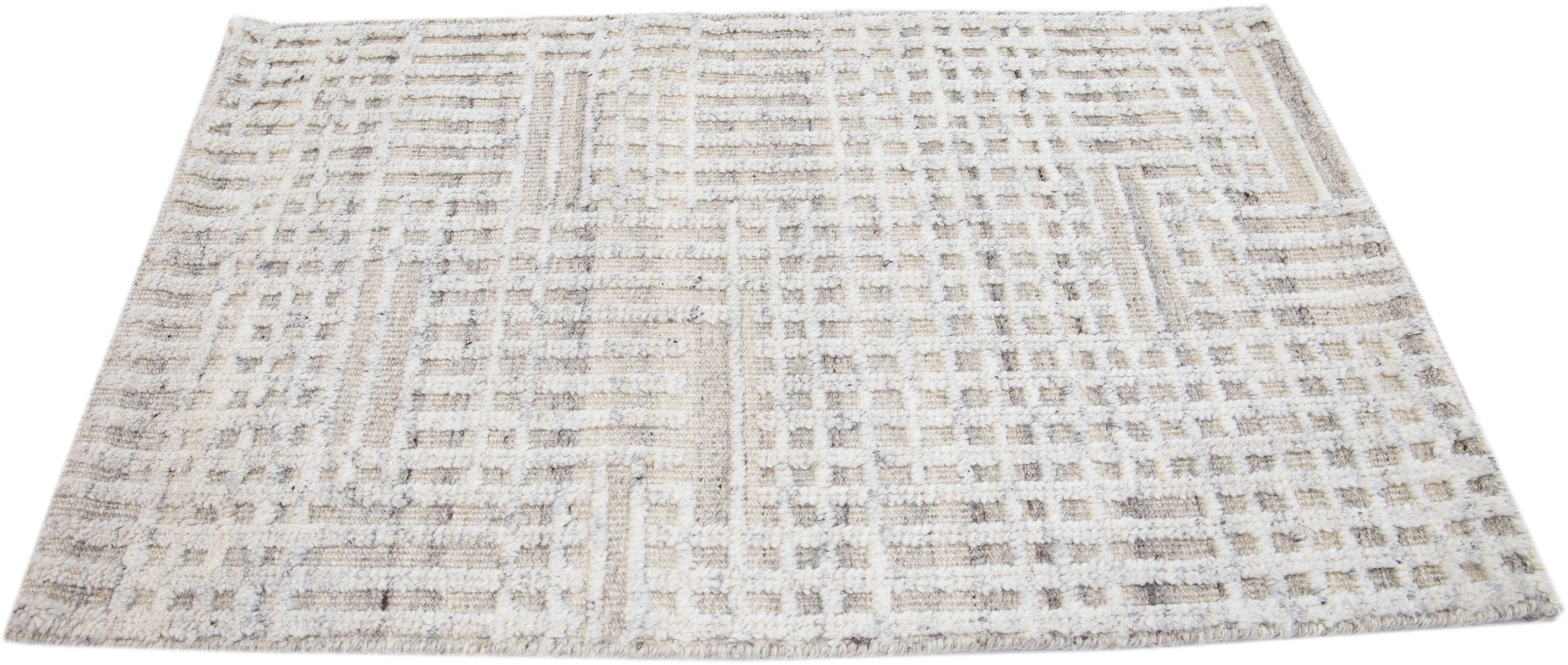 Apadana's Modern Moroccan Style wool custom rug. Custom sizes and colors made-to-order.

Material: 80 Wool and 20 Cotton.
Techniques: Hand-Loomed.
Style: Moroccan.
Lead time: Approx. 15-16 weeks available.
Colors: As shown, other custom colors are
