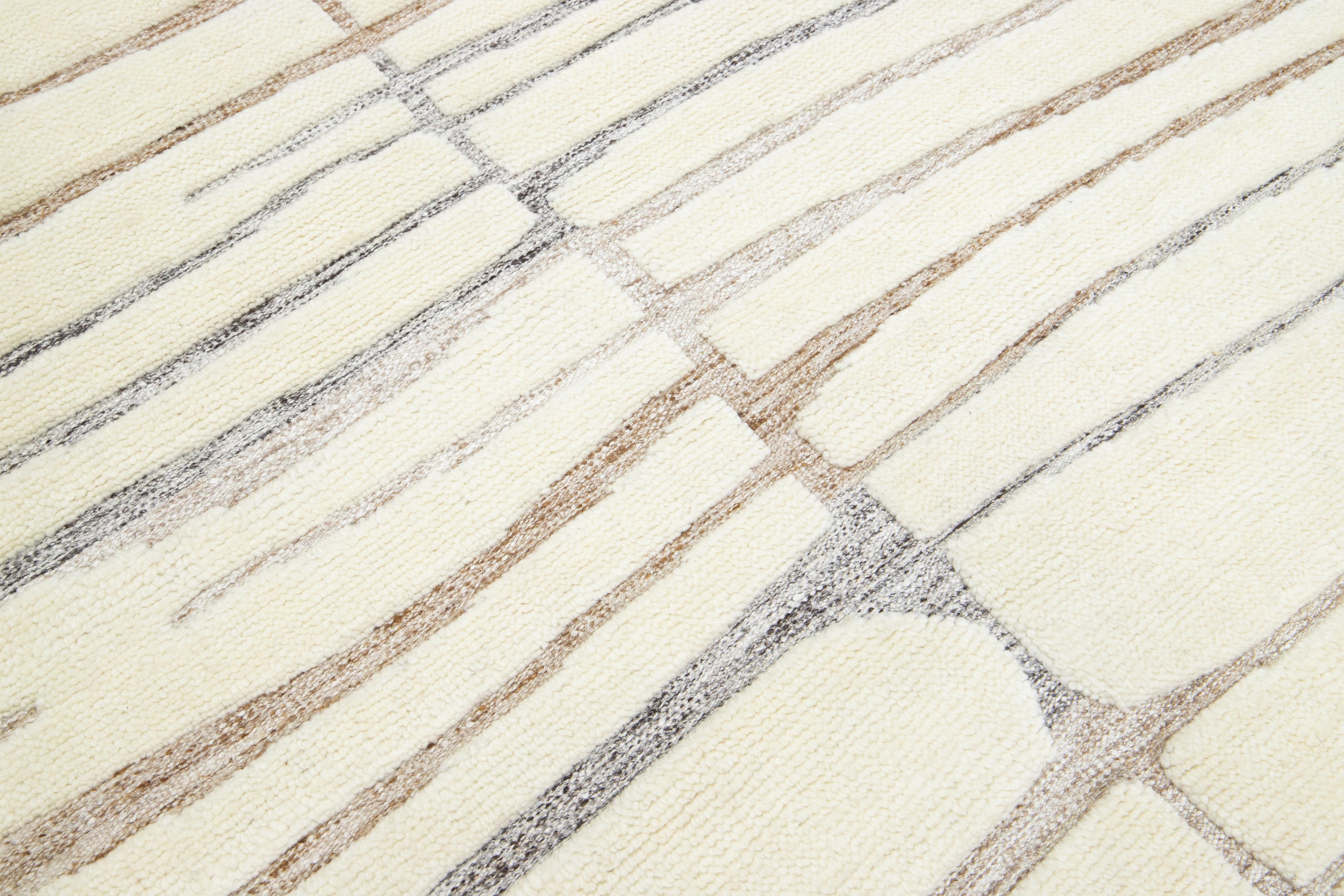 Contemporary Ivory Modern Moroccan-Style Wool Rug Handmade With a Striped Design By Apadana For Sale