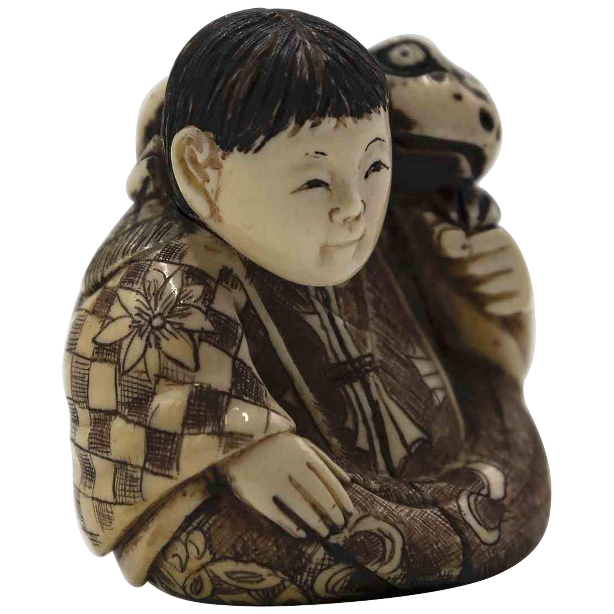 Netsuke of a Boy with a Toad, Late 19th Century For Sale