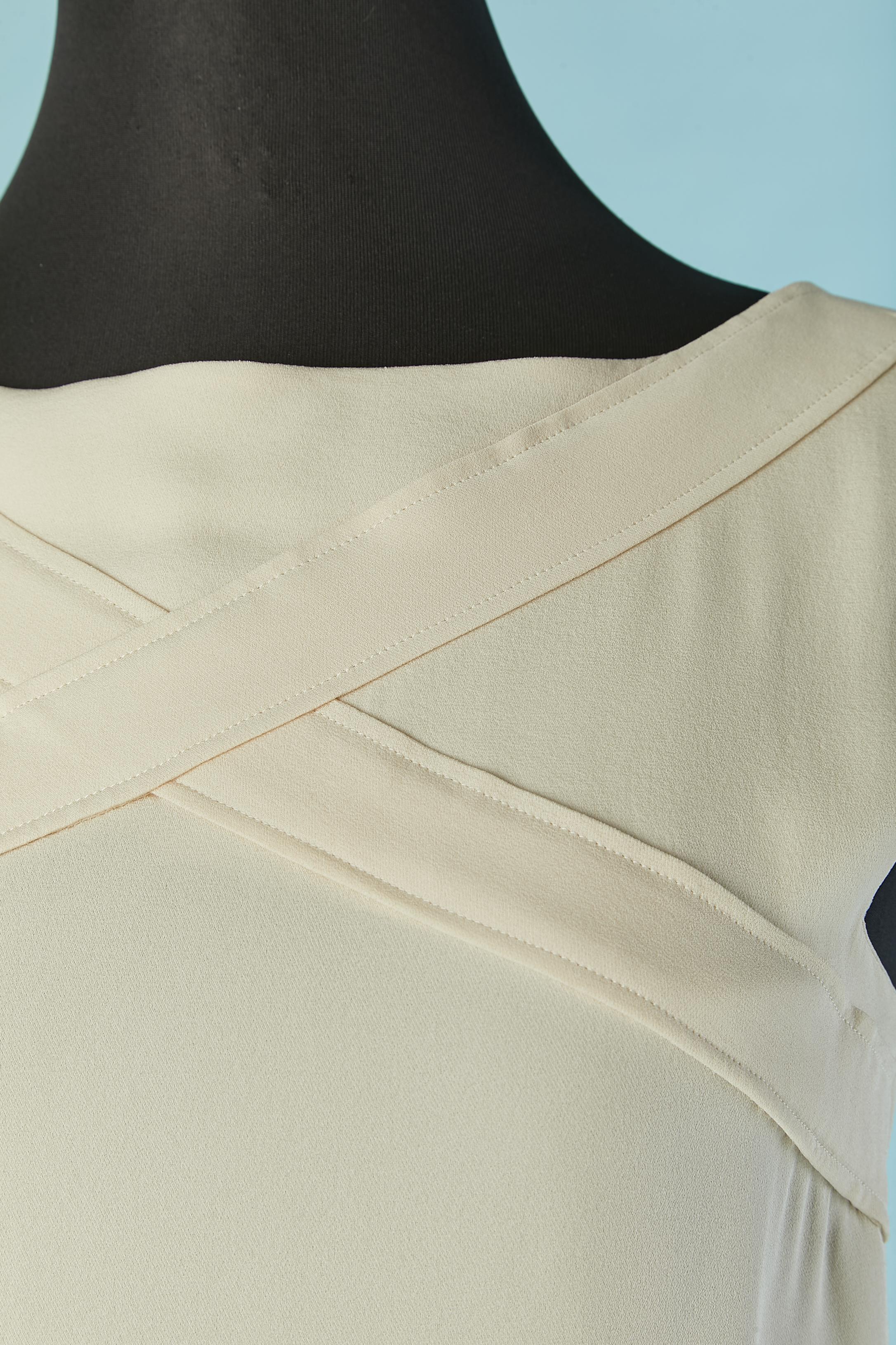 Ivory off-white tank top with cut-work and branded button closure on the back + snap
size 36 (Fr) S 