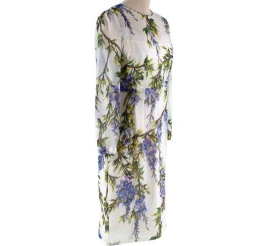 Dolce & Gabbana Elfenbeinfarbenes & lilafarbenes Seidenchiffonkleid mit Glyziniendruck
 

 - Langärmeliges, knielanges Kleid
 - Durchsichtiges Material mit eingearbeitetem Unterkleid
 - Slipkleid aus Seide mit Spitzenbesatz 
 - Durchgehender