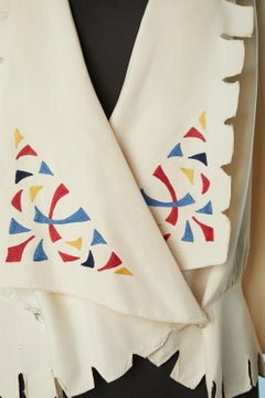 Ivory raw silk shirt with blue, yellow and red thread embroideries Circa 1920's