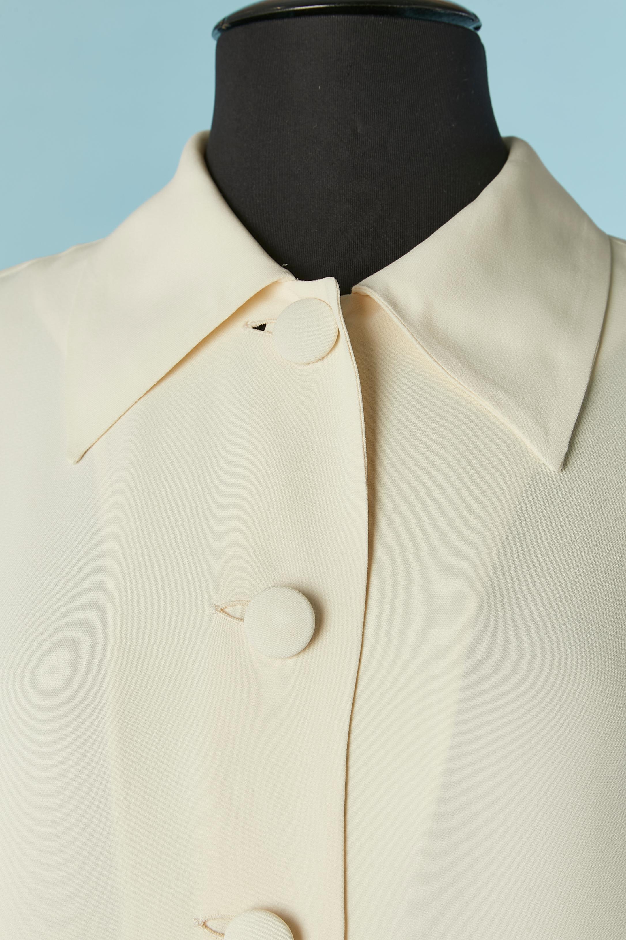 Ivory shirt with fabric buttons. No fabric composition tag but probably rayon. 
Opening on the cuffs for cuff links (not provided) 
Size on tag : 42 (It- 38 (Fr) 8 (Us) M but can fit also L 
