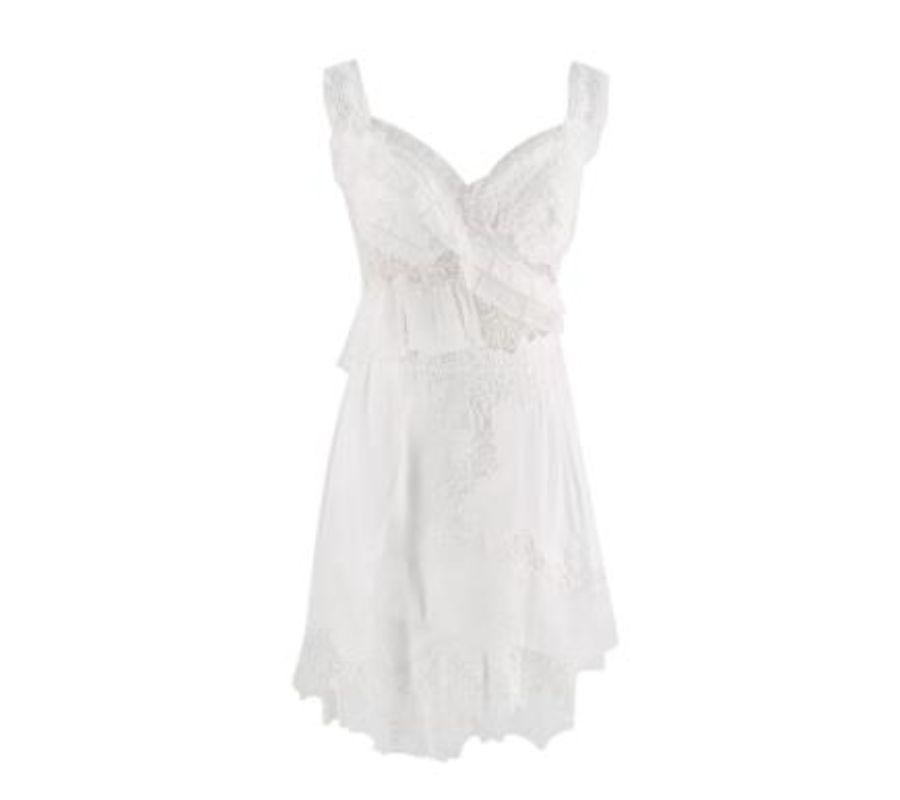 Ermanno Scervino Ivory Silk Chiffon & Lace Short Dress
 
 - Delicate fusion of finely pleated silk chiffon and floral lace
 - Thick lace straps, and sweetheart neckline
 -Ruffled embellished bodice and skirt, with sheer panels on the side and back
