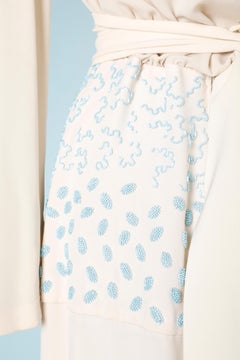 Ivory silk crêpe dress with turquoise blue beadwork and belt