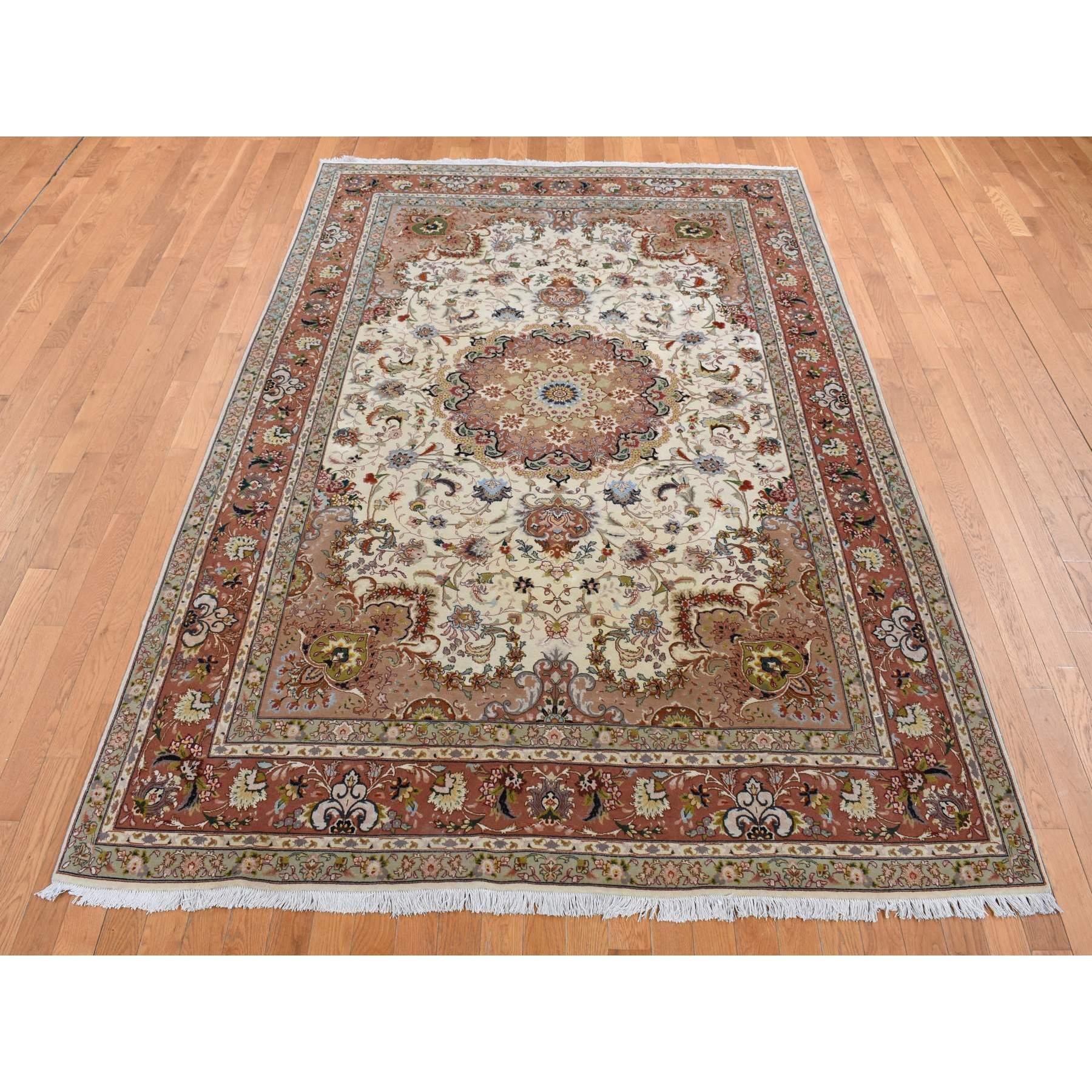 This fabulous Hand-Knotted carpet has been created and designed for extra strength and durability. This rug has been handcrafted for weeks in the traditional method that is used to make
Exact Rug Size in Feet and Inches : 6'9